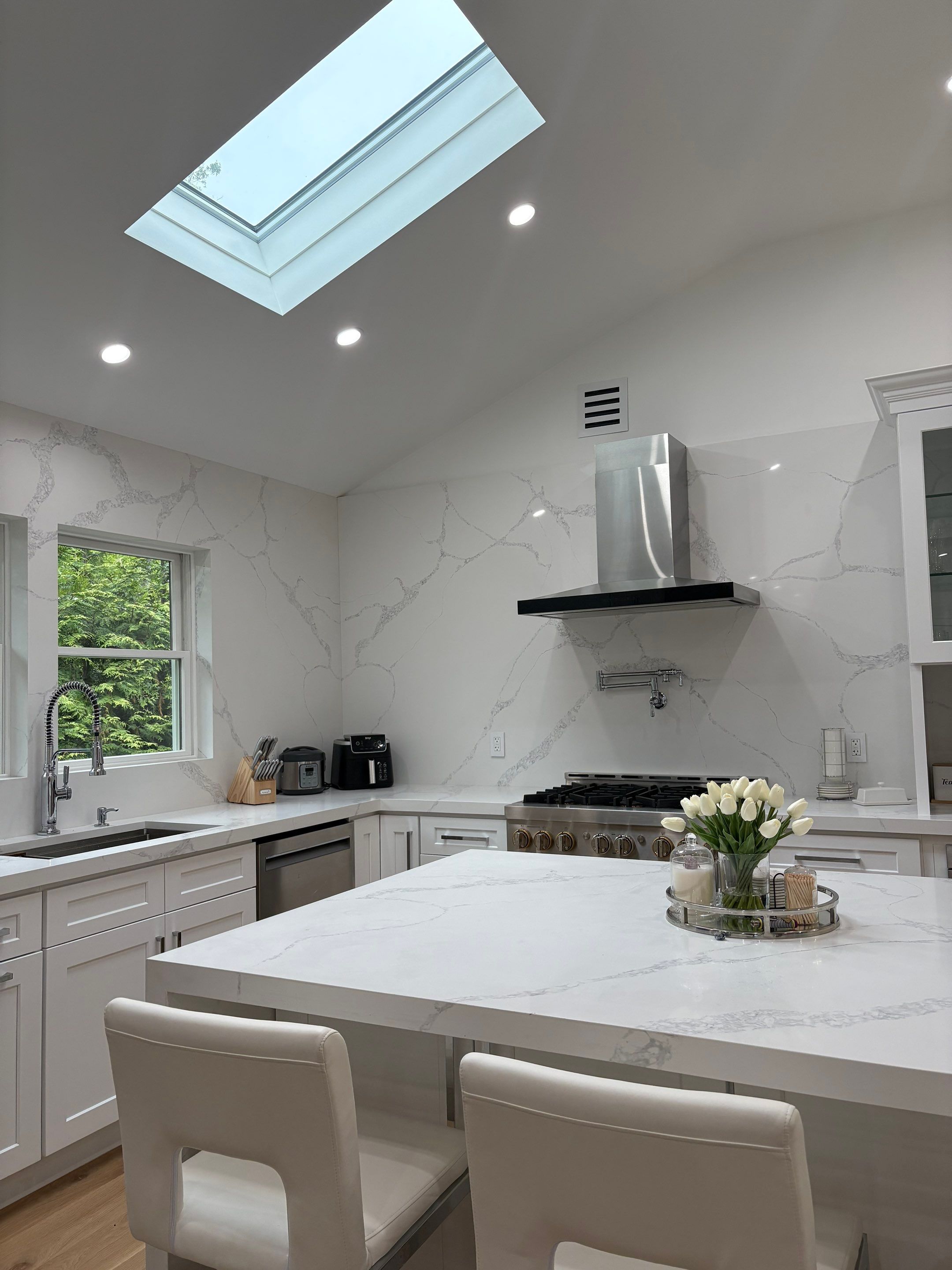 Cabinet Installation using white shaker by Antrax Corp