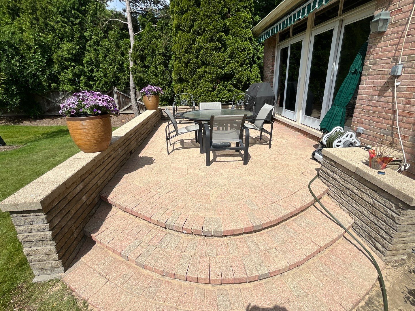 Concrete and Brick Paver Restoration Cleaning by Northern Power Washing LLC.
