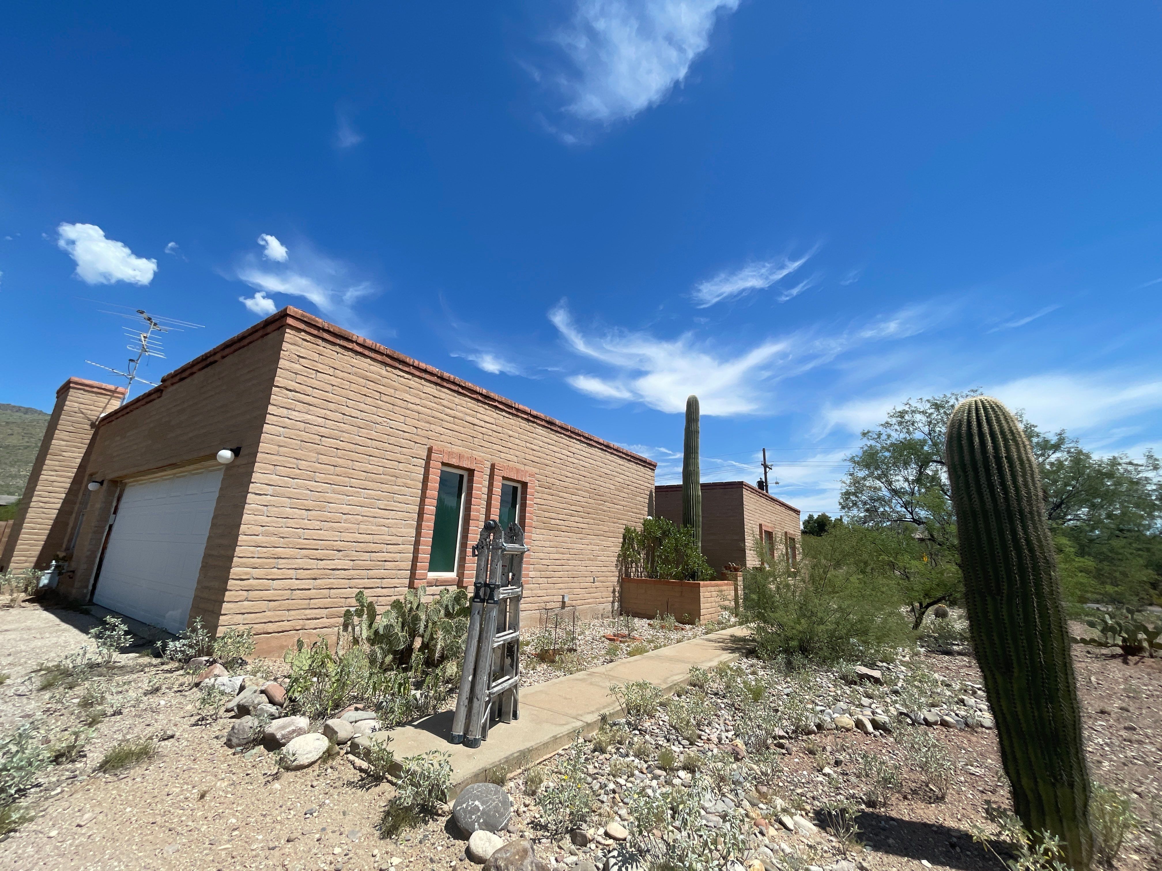 Comprehensive Flat Roof Restoration and Tile Repair in Tucson