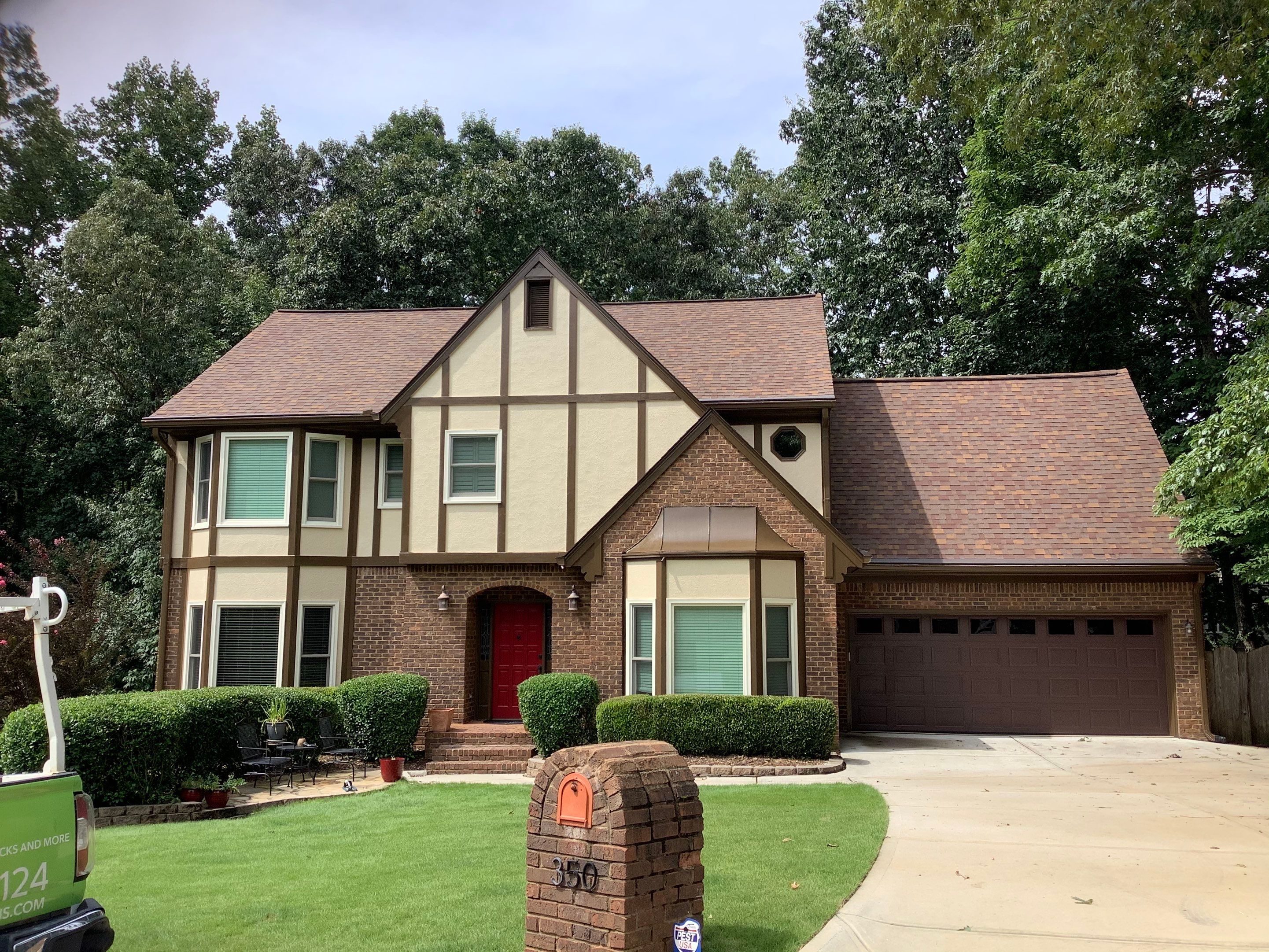 Complete Exterior Painting and Trim Refresh for Roswell Tudor Home by Swift Home Renovations