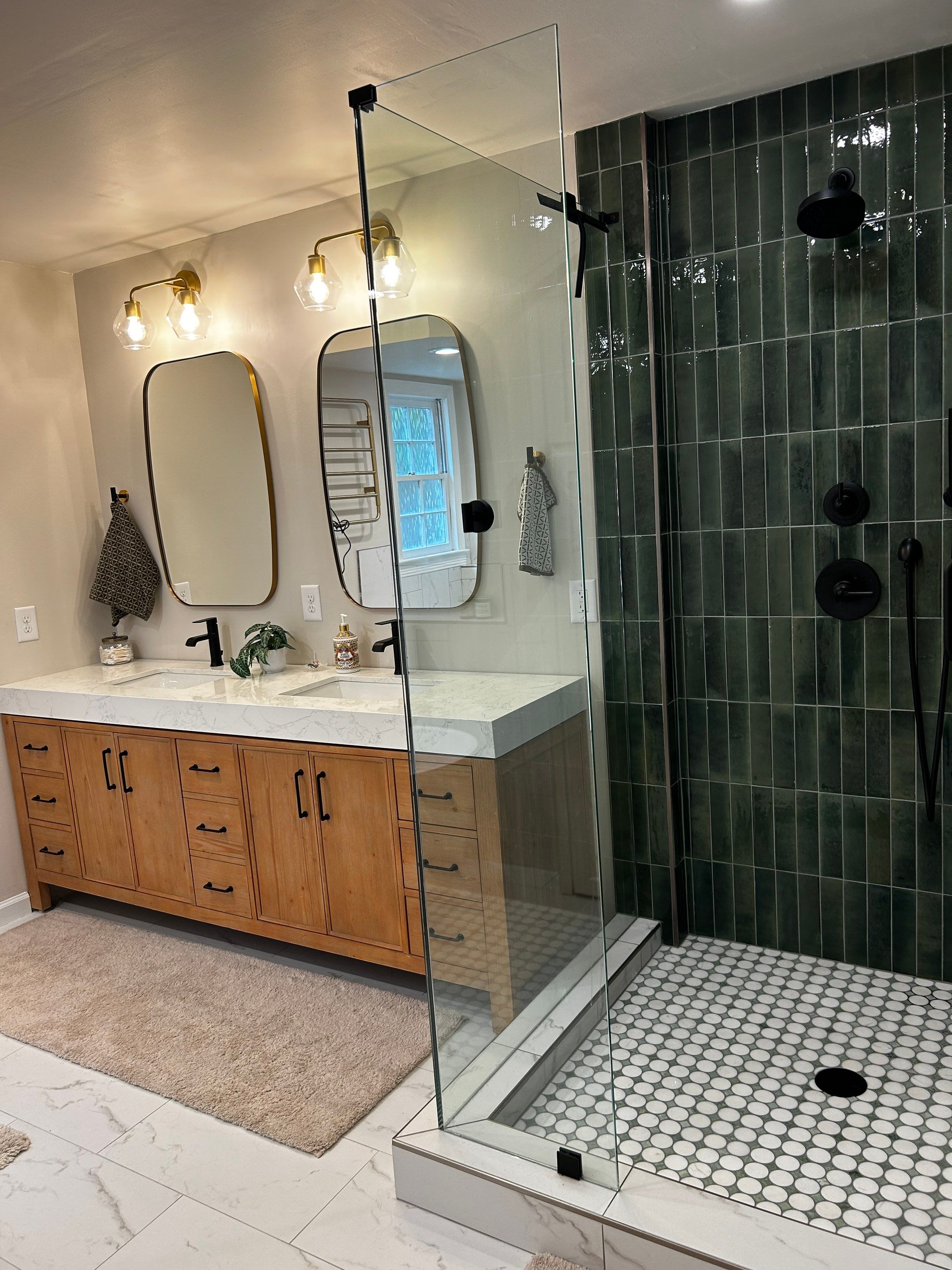 Spa like bathroom by Footprints Bath and Tile of East Atlanta