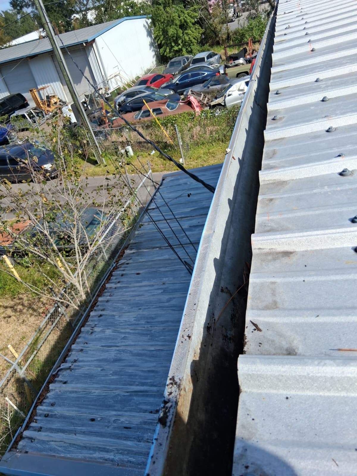 Clean Gutters and Seal Seams in Lakeland FL by Gutter Professors