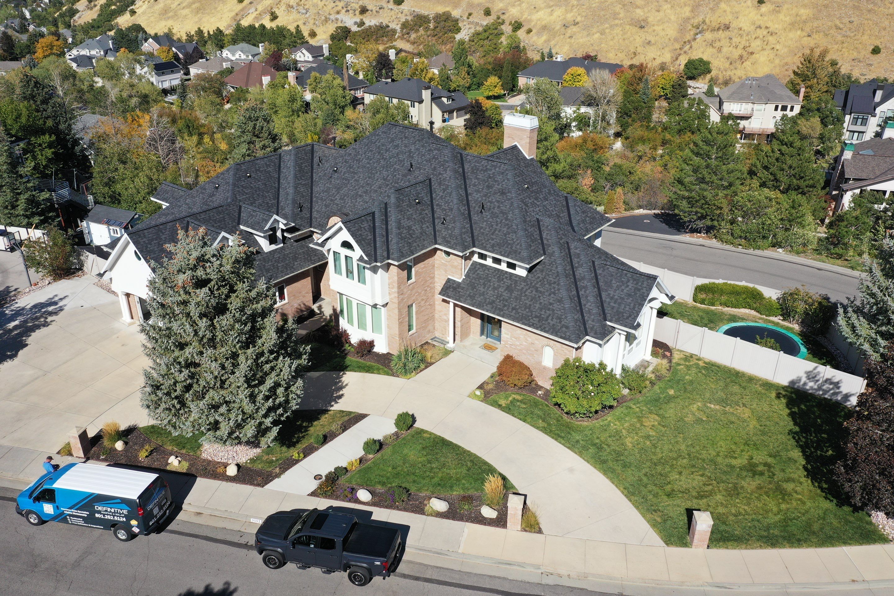 Residential Roofing installation  by Definitive Construction