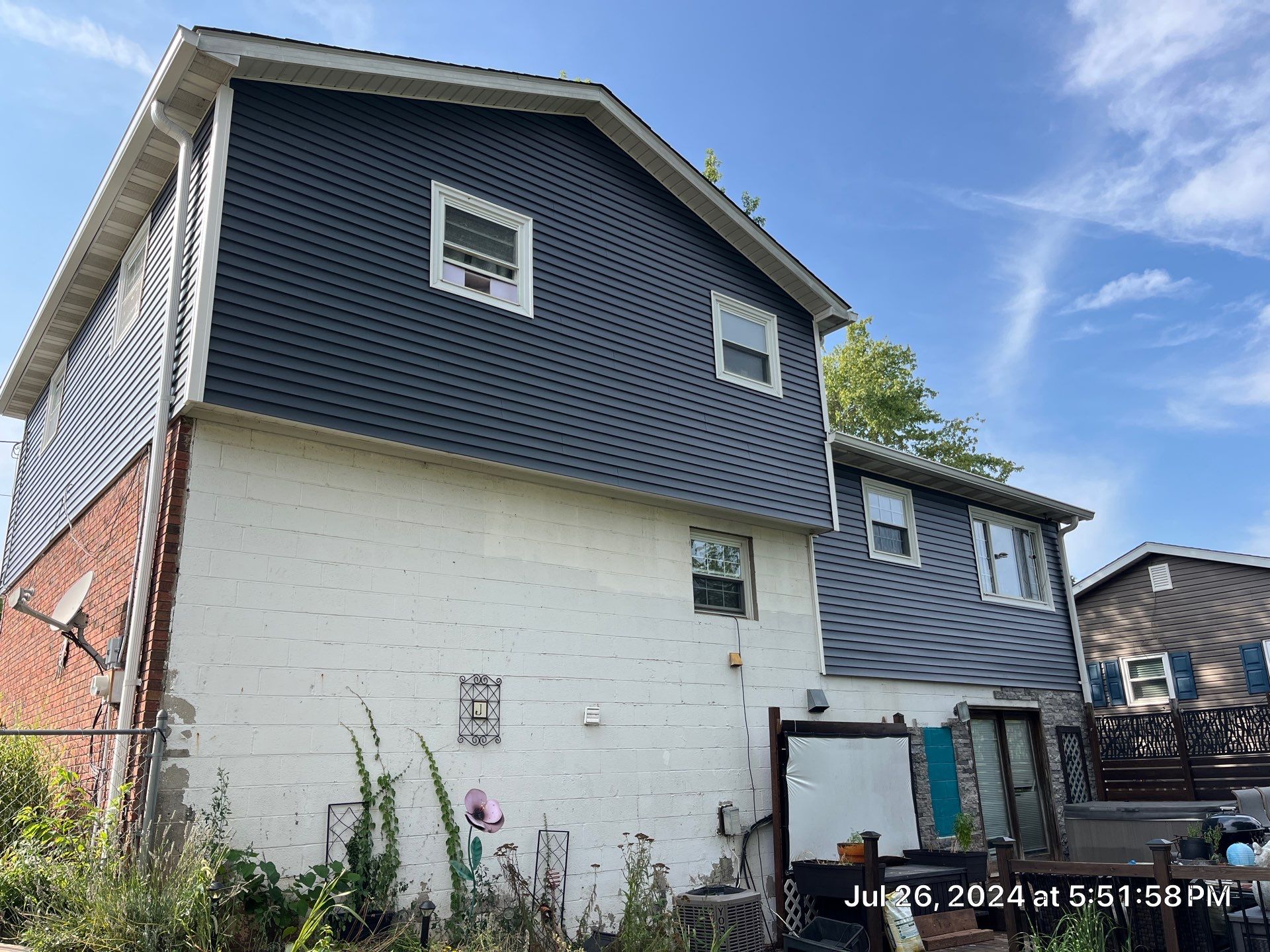 Siding Installation using Mastic Plygem Carvedwood by Fahey Roofing + Contracting
