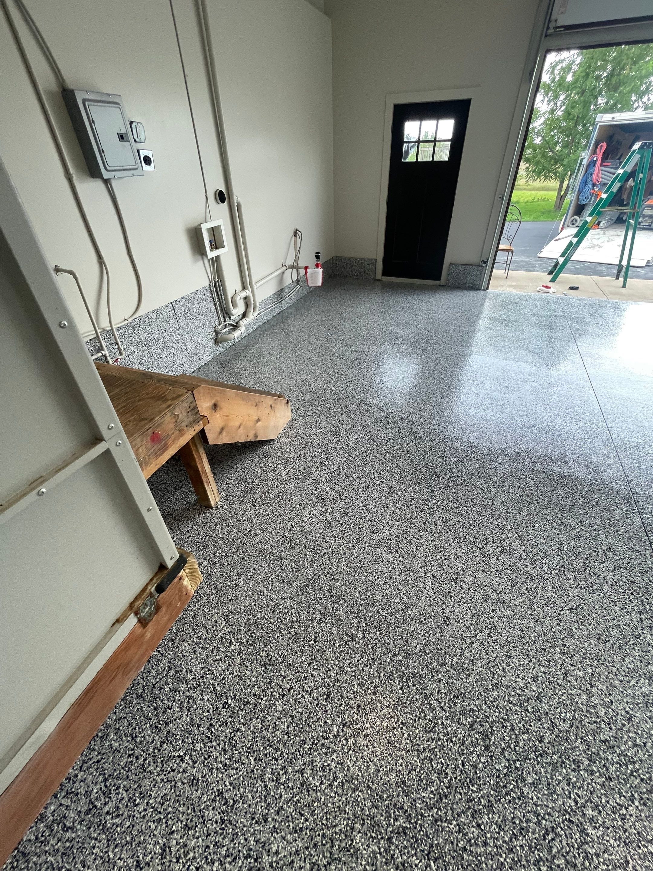 Domino Flake Floor Coating and Crack Repair in Chancellor by Select Painting, Coatings & Garage Cabinets