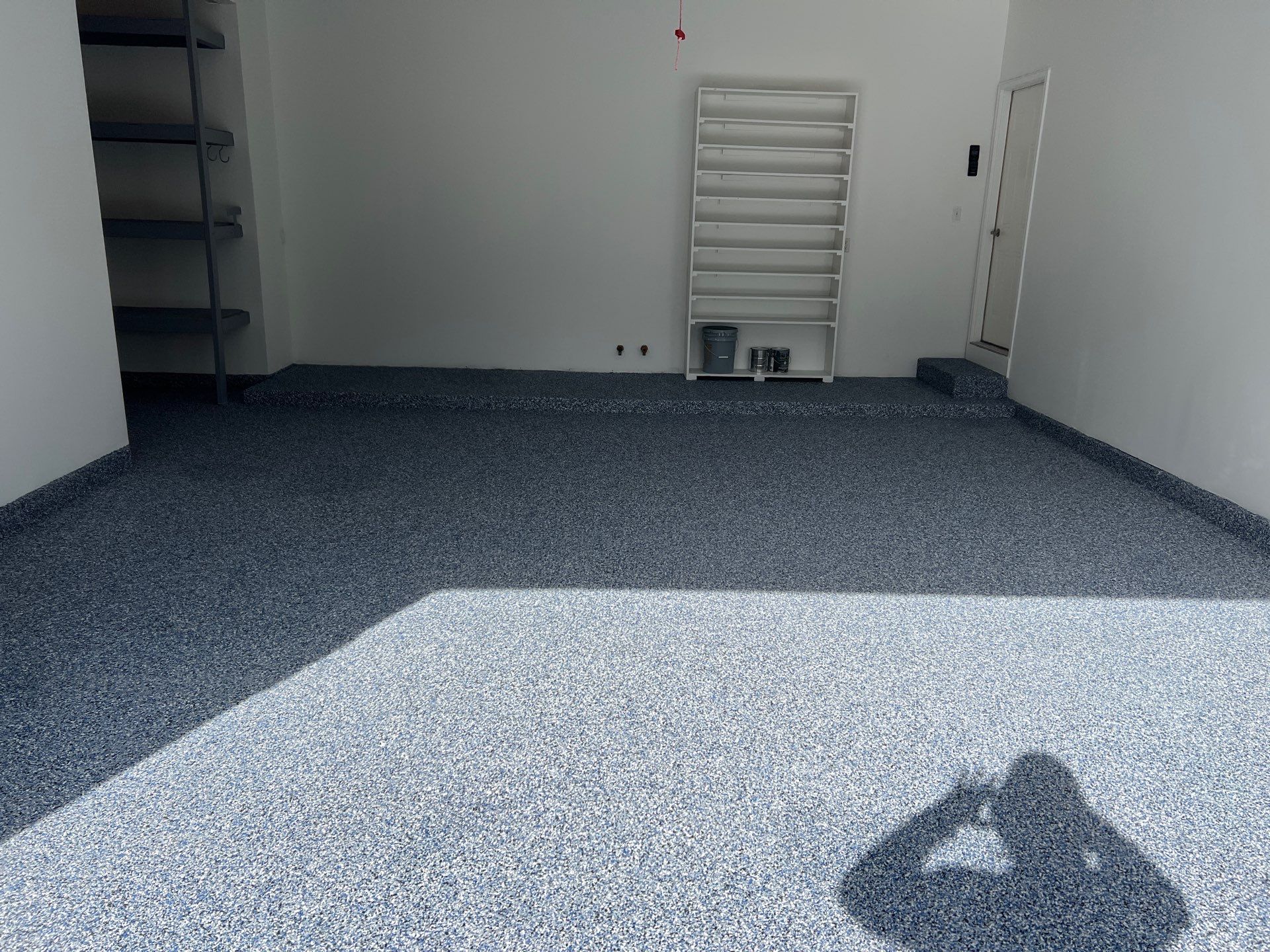 Custom Epoxy Flake Floor and Garage Wall Renovation in Ada by Gordon Painting