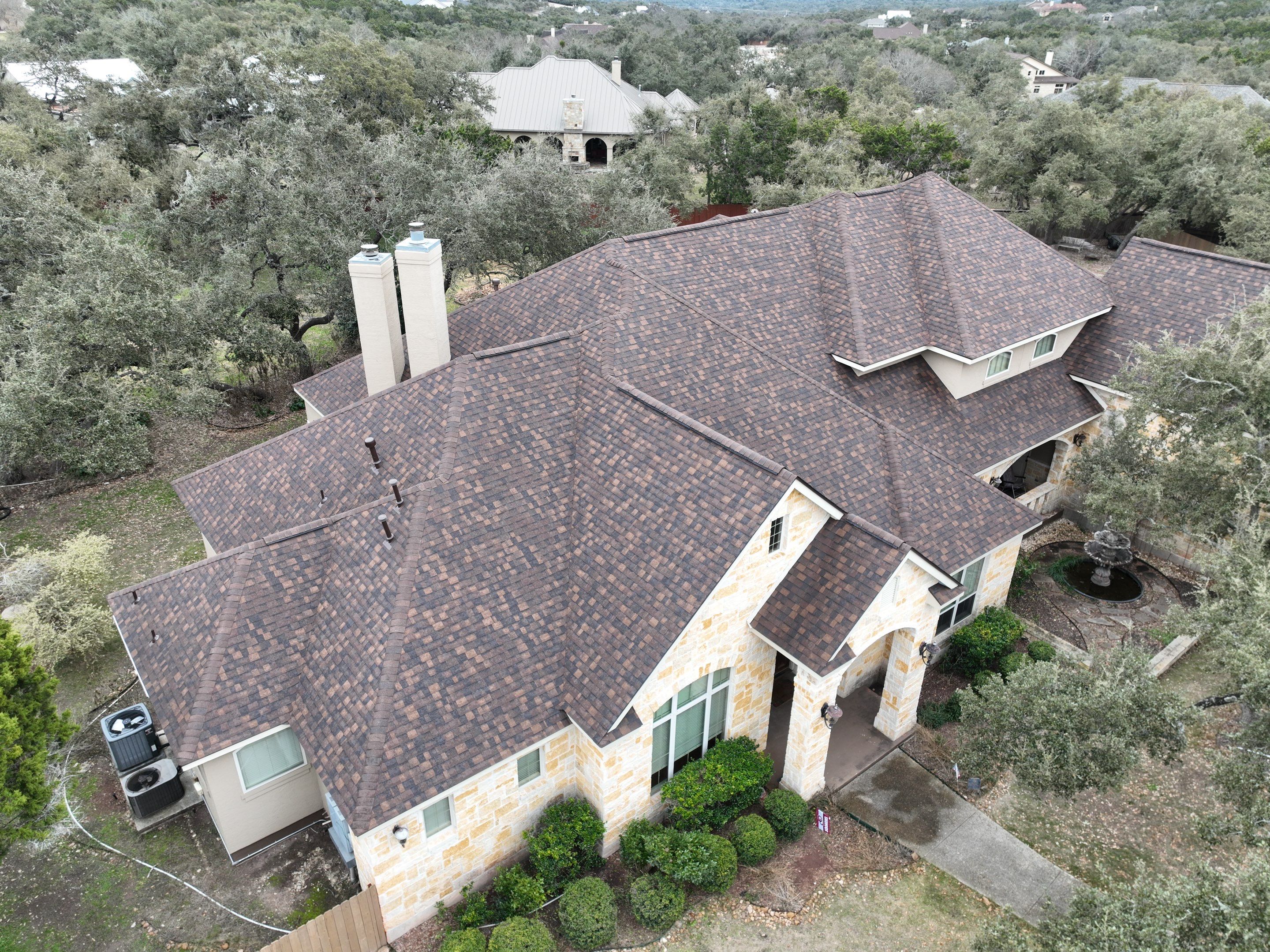 Residential Roof Replacement using 30 Year Laminate Shingles with High Profile Ridge by Premier Roofing and Contracting
