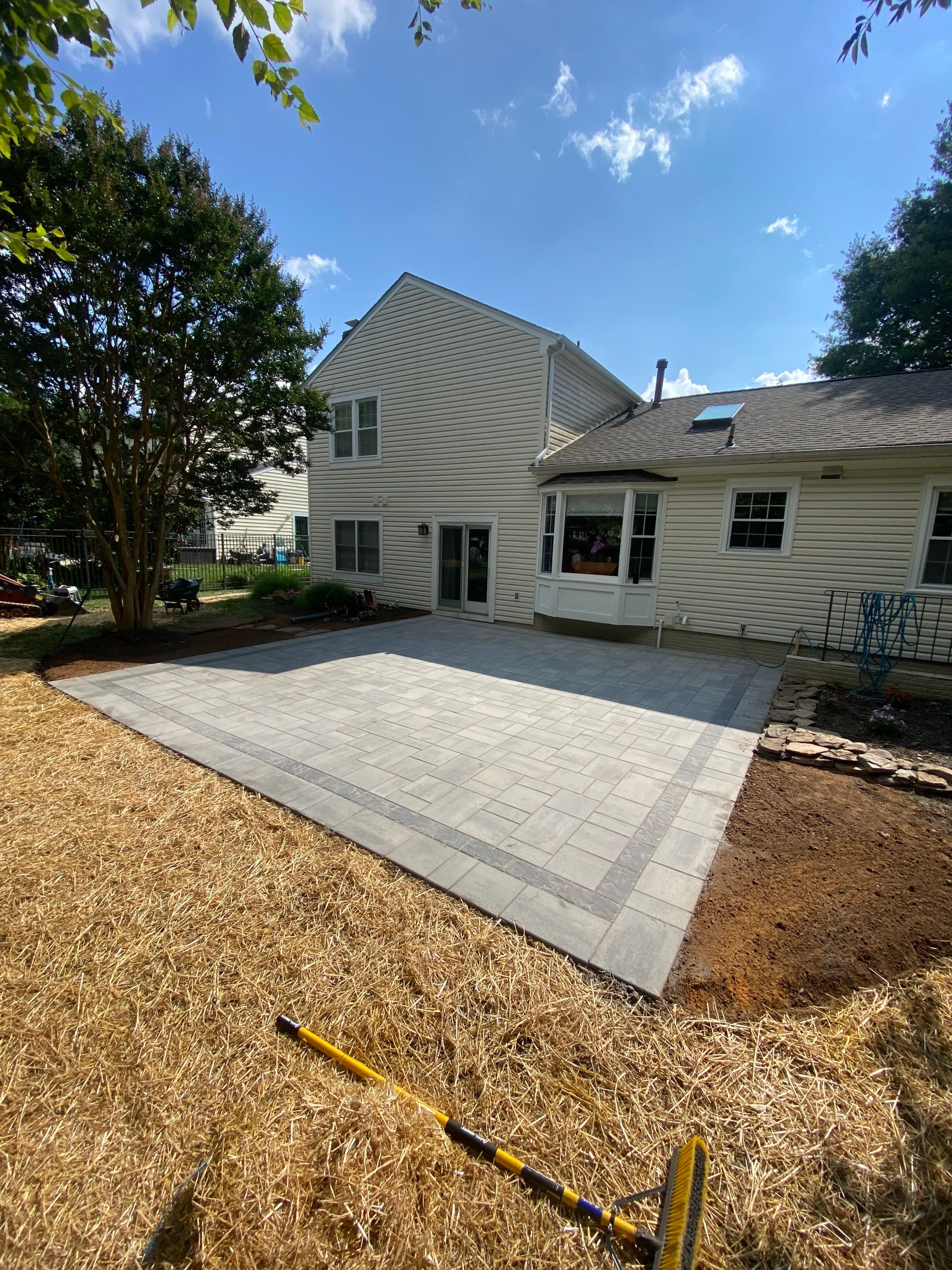 Backyard Transformation using Techo-Bloc Pavers by The Smet Companies, LLC