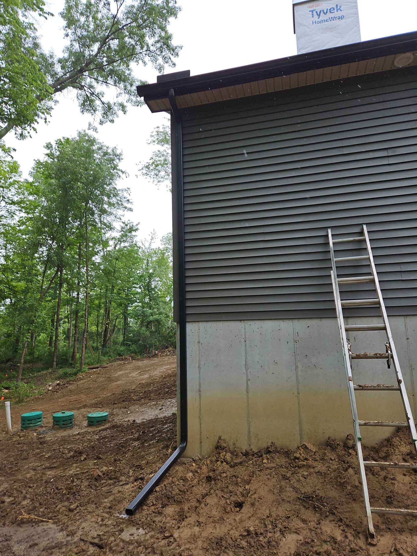 Gutter Installation using 5" Seamless Gutters and Downspouts by RoofX 