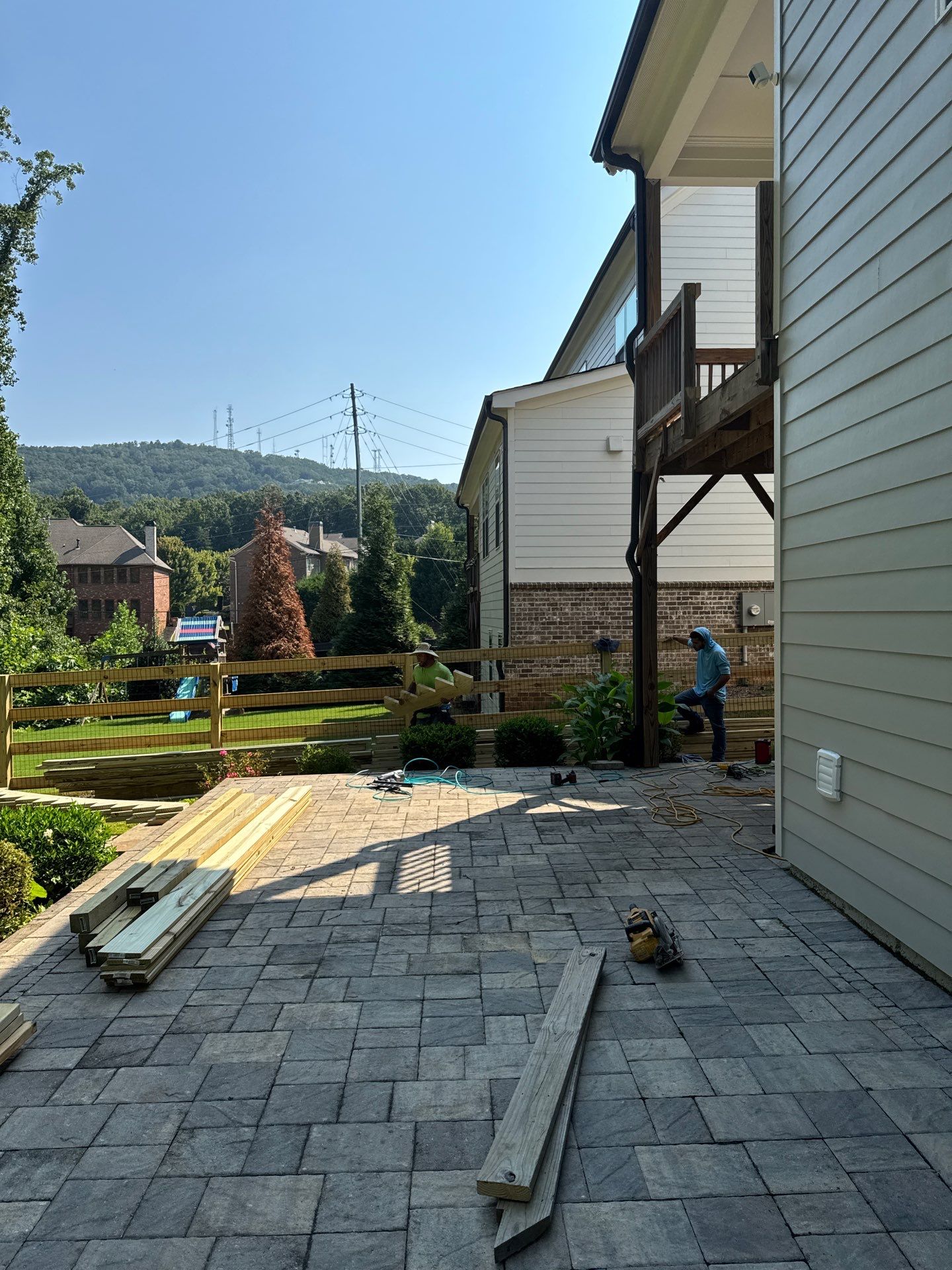 Elevated Deck Stair Construction and Paver Patio in Marietta by Swift Home Renovations
