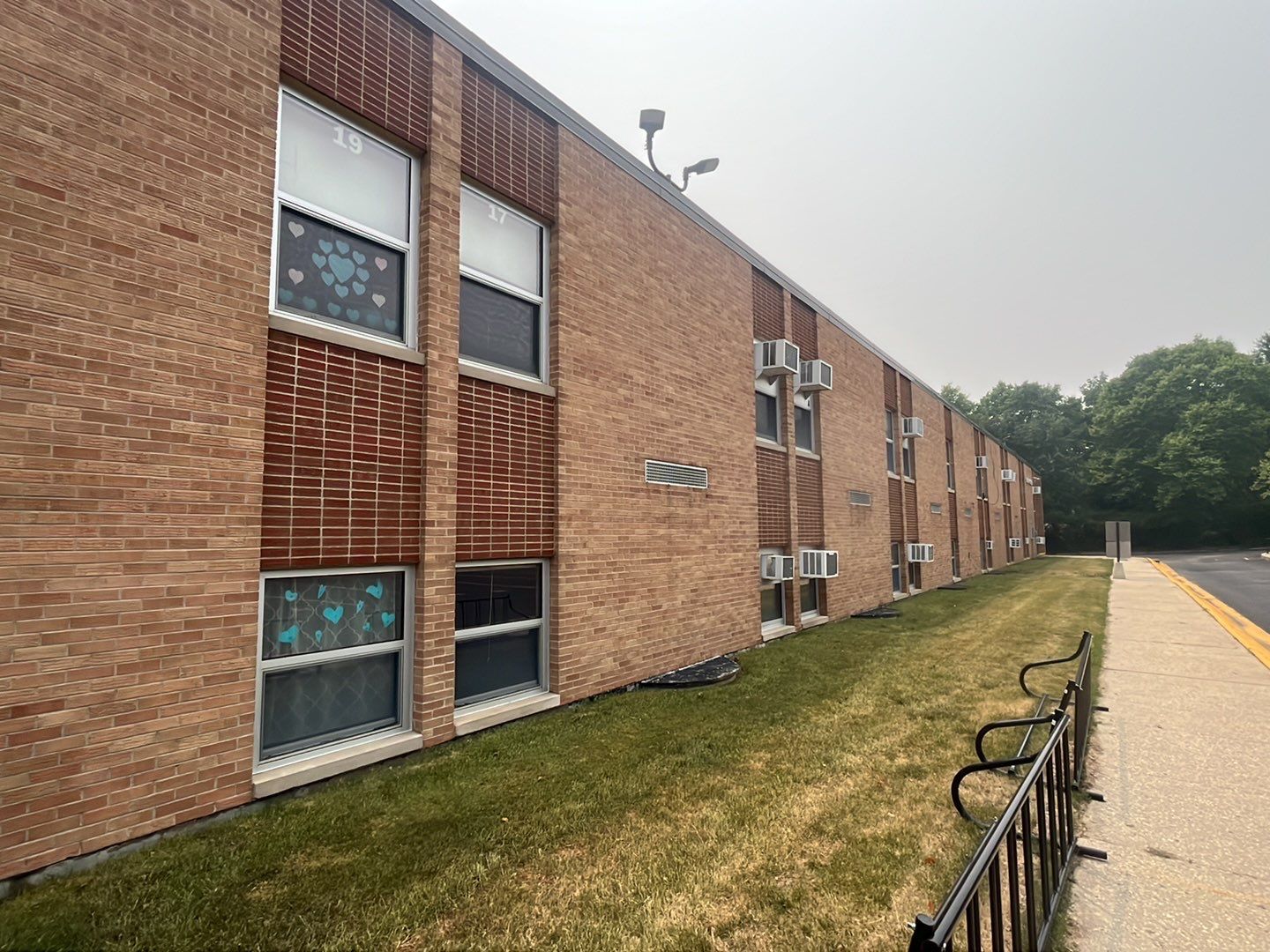 Commercial brick exterior cleaning by Northern Power Washing LLC.