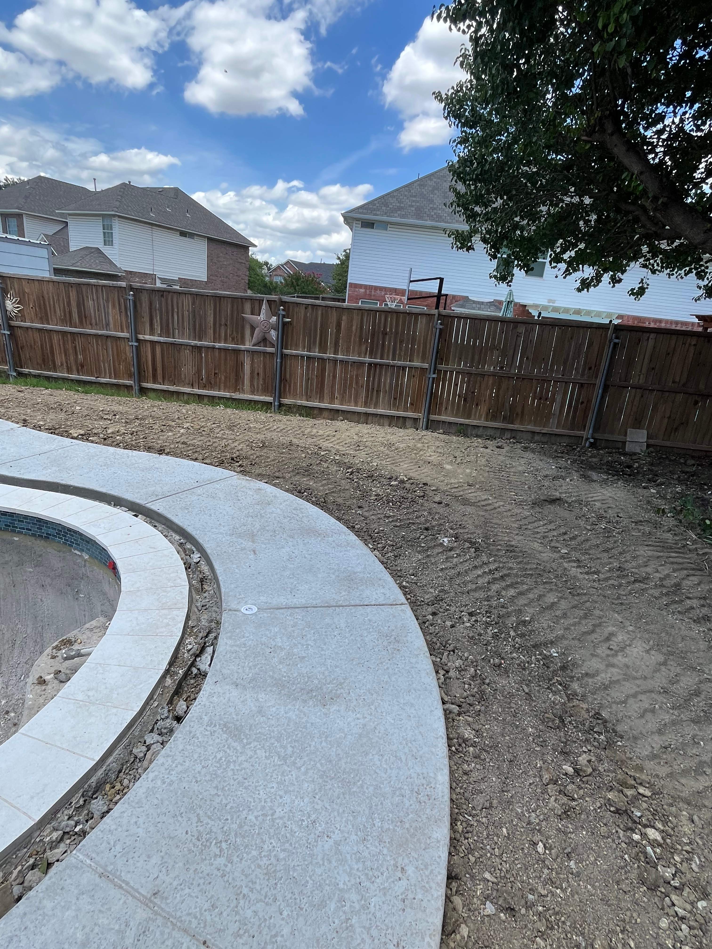 Compact Freeform Spool with Dark Coping by Pinnacle Pools and Spas - DFW