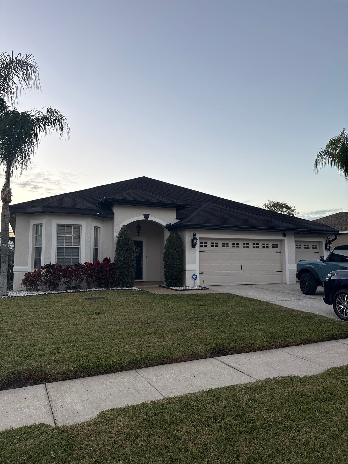 Black Aluminum Gutters with Matching Downspouts in Tampa FL by Gutter Professors