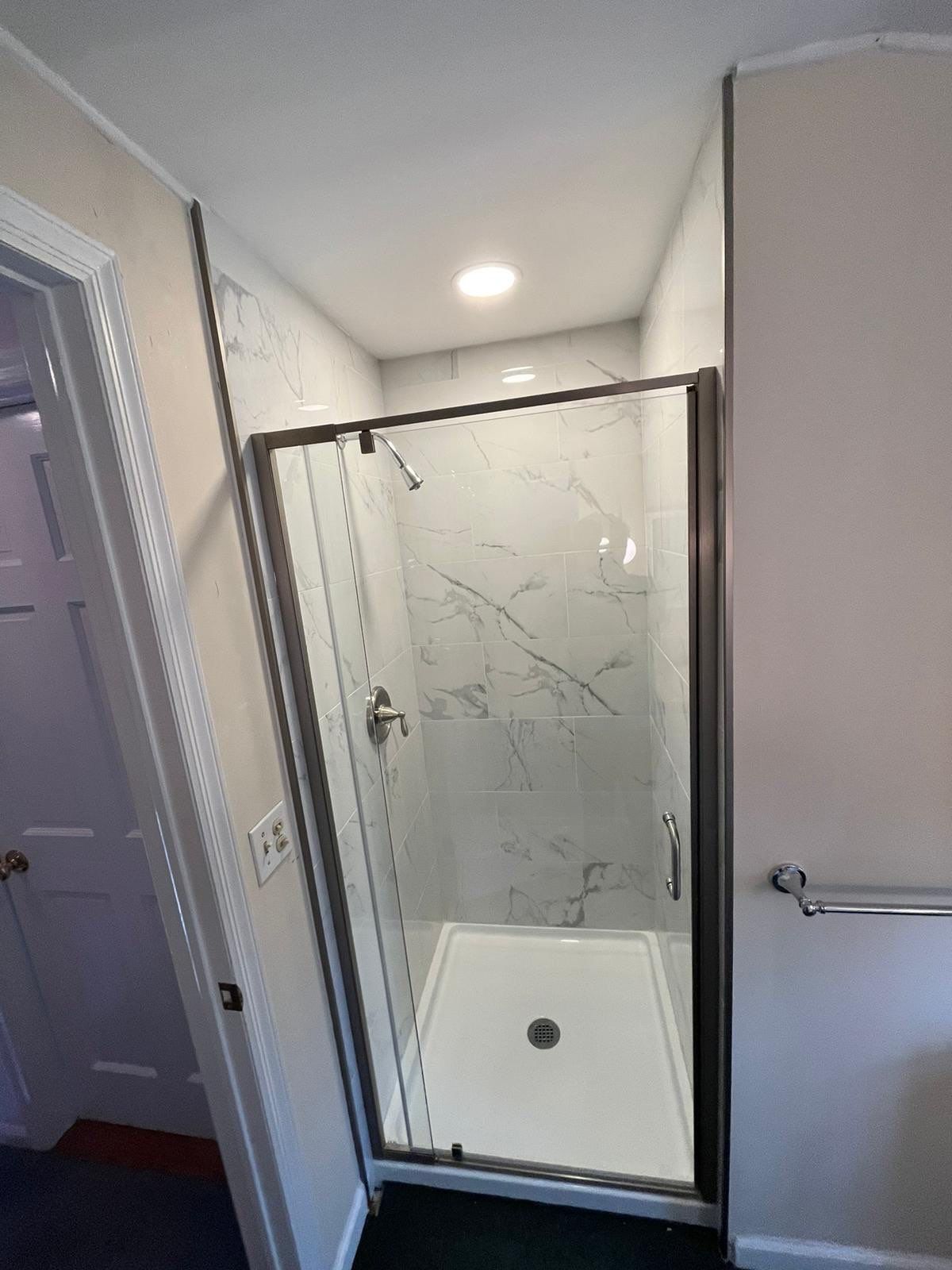 Bathroom Remodel using Tile by Home Concepts Construction