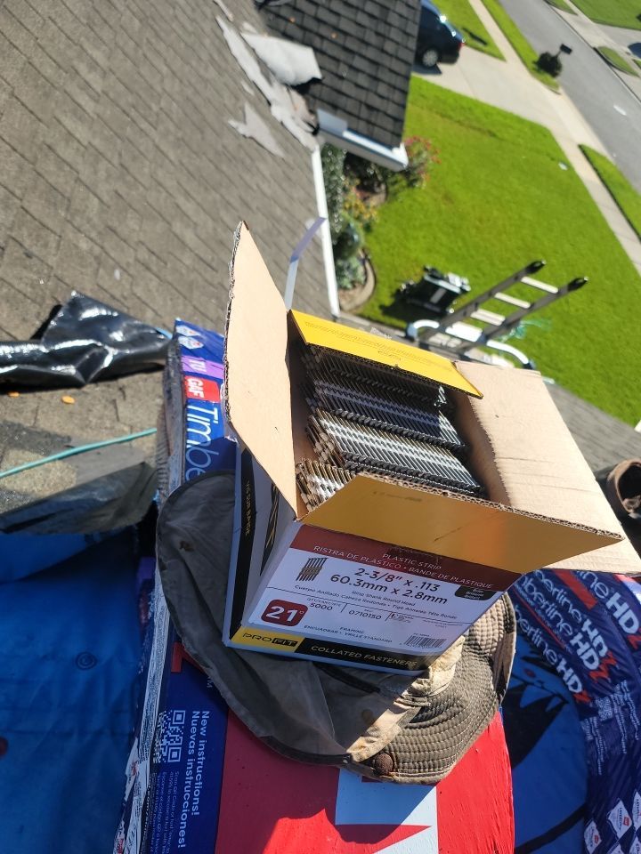 Residential Roofing Installation using Roof Replacement by American Roofing & Construction LLC