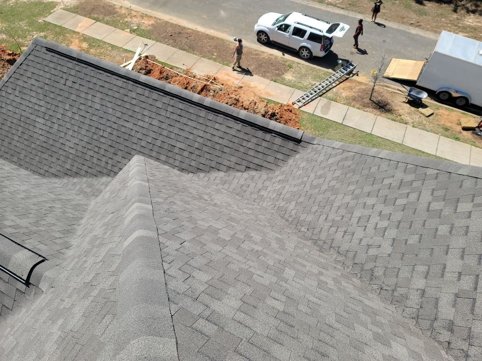Residential Roofing Installation using Roof Replacement by American Roofing & Construction LLC