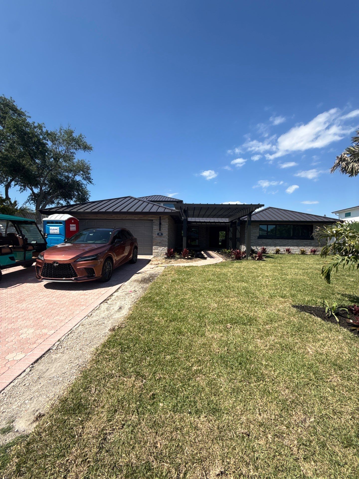 7-Inch Smooth Box Seamless Gutters using black seamless gutters in Siesta Key Fl by Gutter Professors