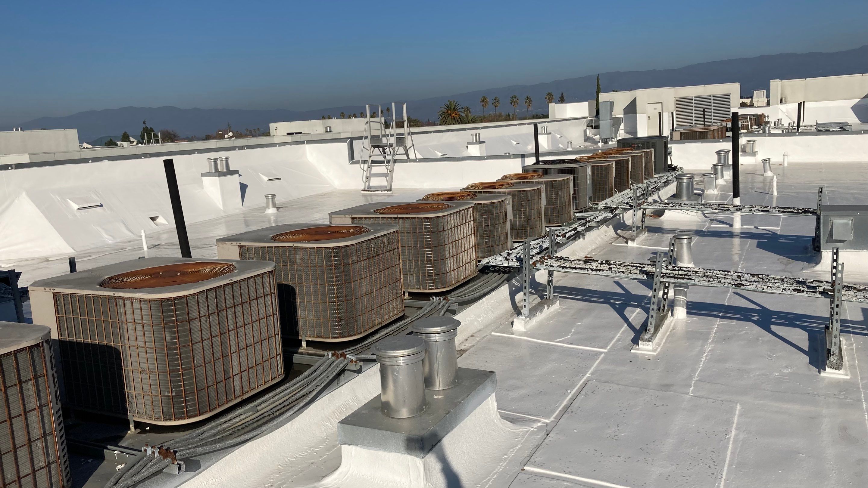 Commercial Flat Roof Repair and Reflective Silicon Coating in San Jose by Eastman Roofing & Waterproofing Inc.
