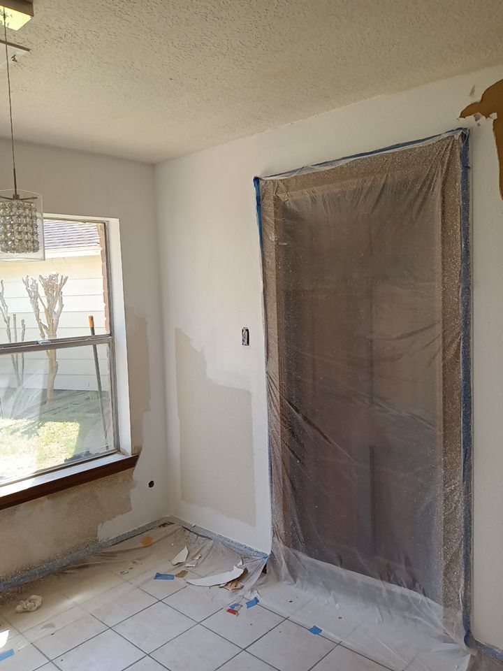 Interior and exterior painting project by Roof Concepts Construction
