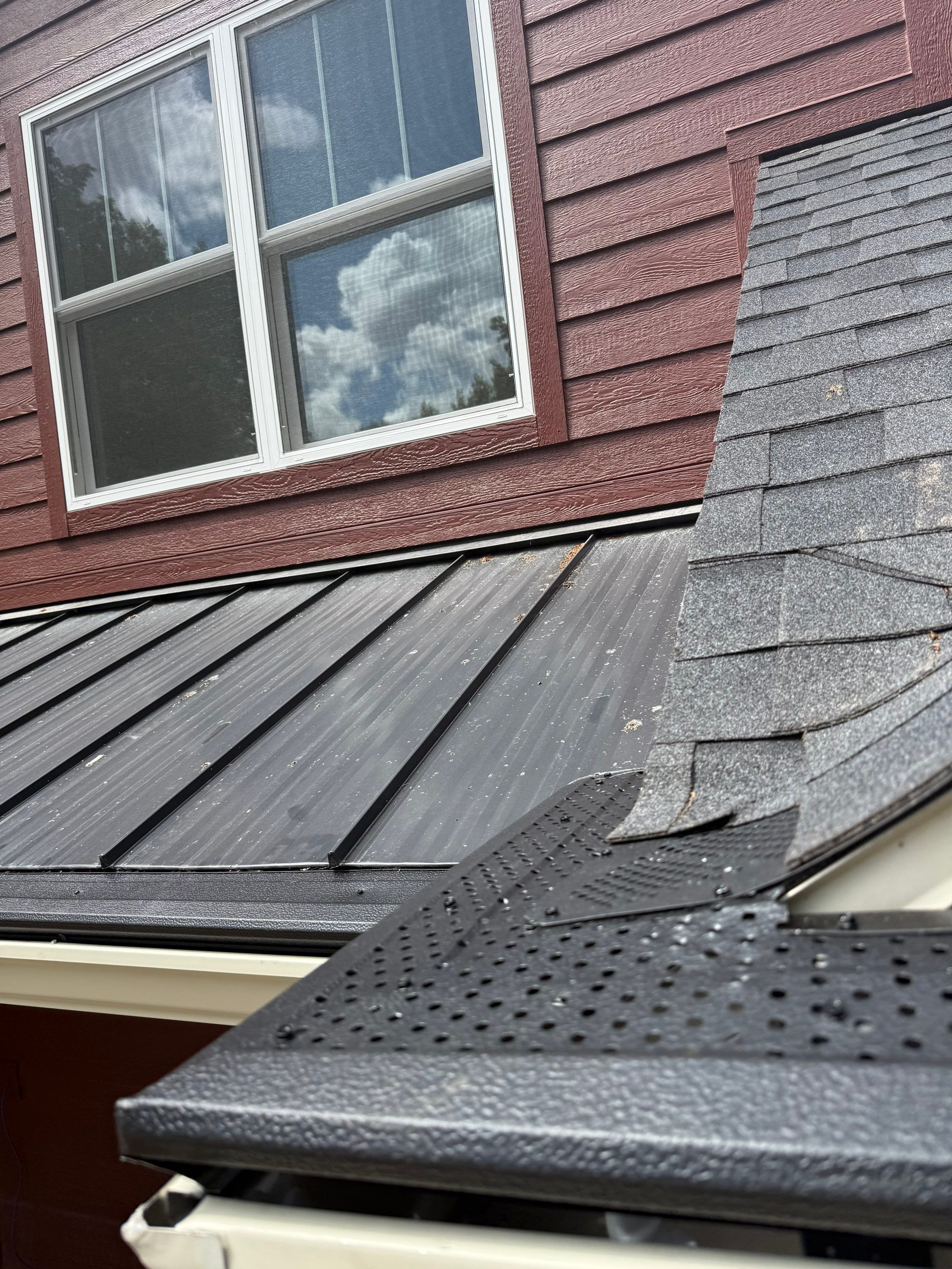 Gutter and Gutter Helmet Installation for Charlevoix Residential Project by Rainbow Seamless Systems