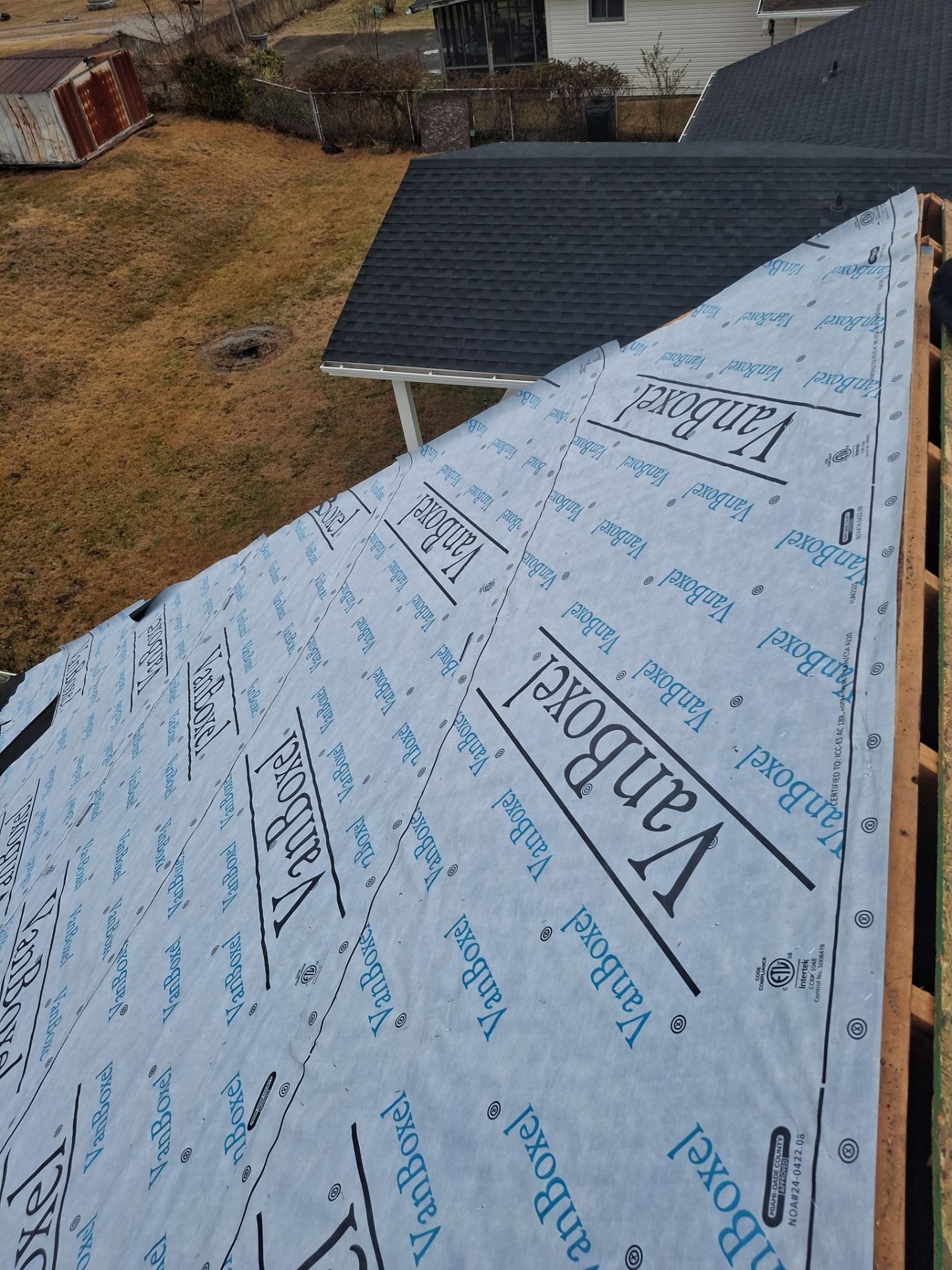Residential Roofing Installation using GAF Timberline HDZ Charcoal by Rainstoppers Roofing