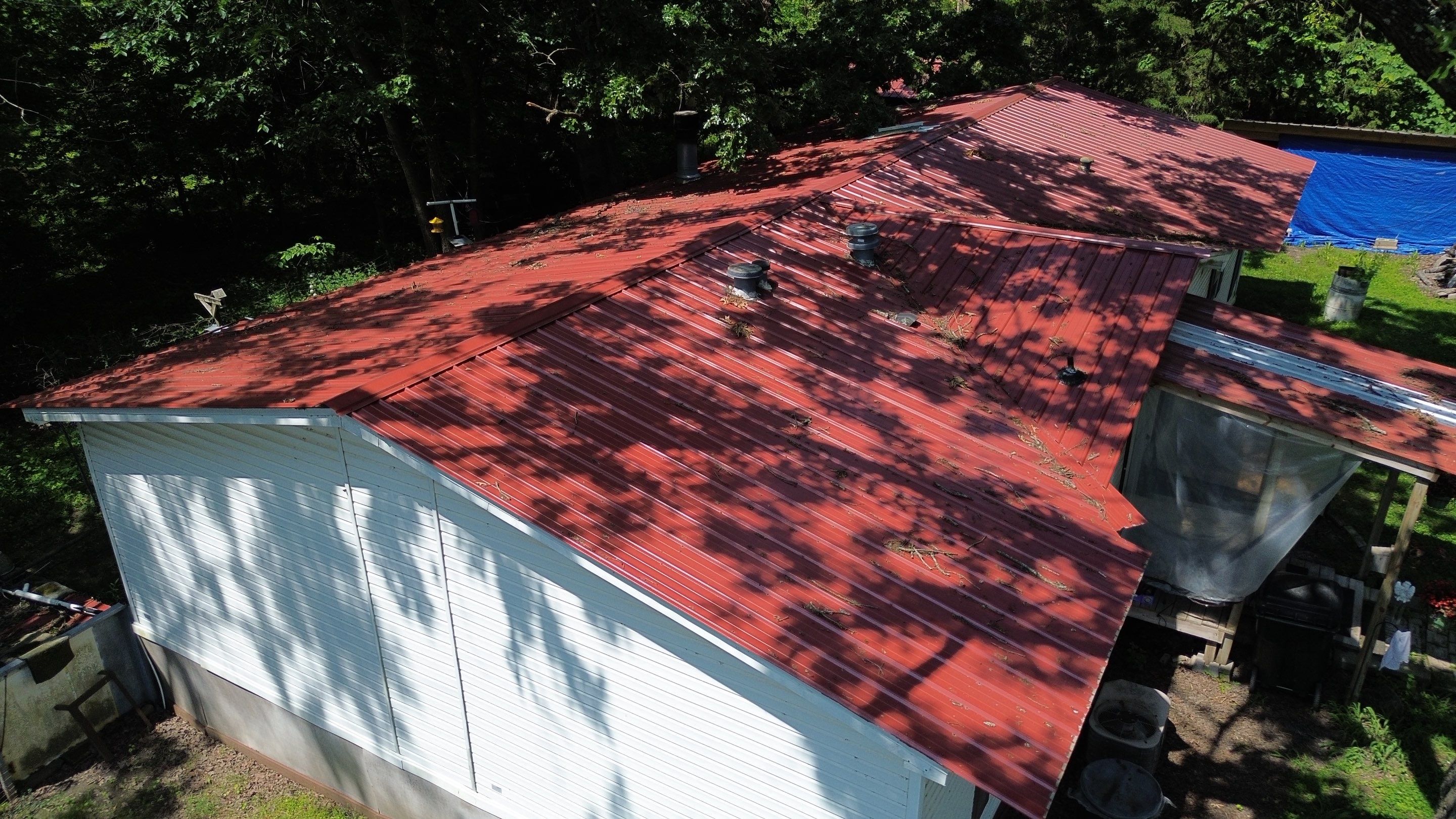 Residential Roofing Install - 26 Gauge G-Rib Metal - Color Red by Titan Commercial & Residential Roofing 