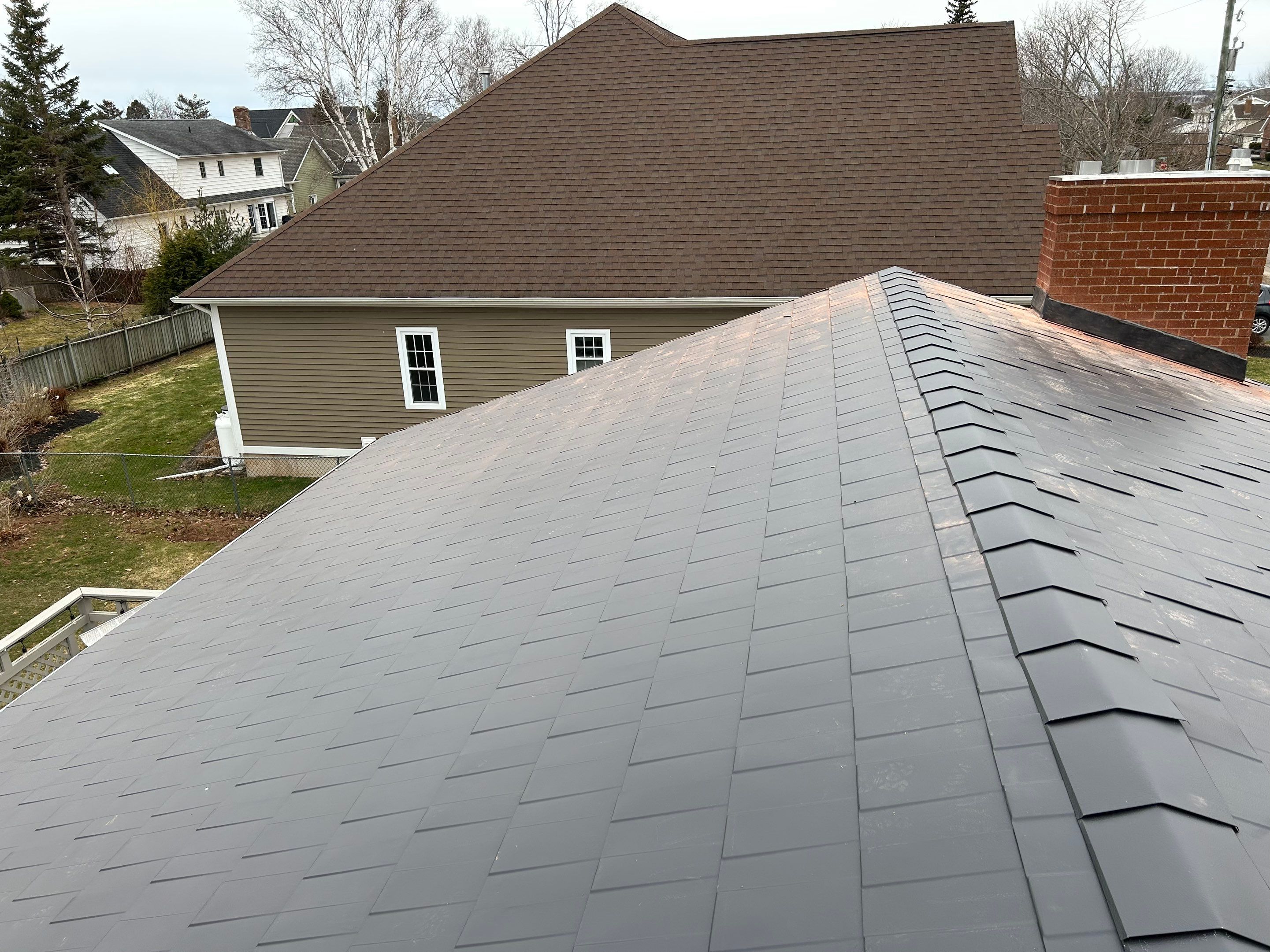 Residential Roofing Installation using Wakefield Bridge Steel Shingle by Ideal Steel by Artisan Roofing & Home Improvements Inc.