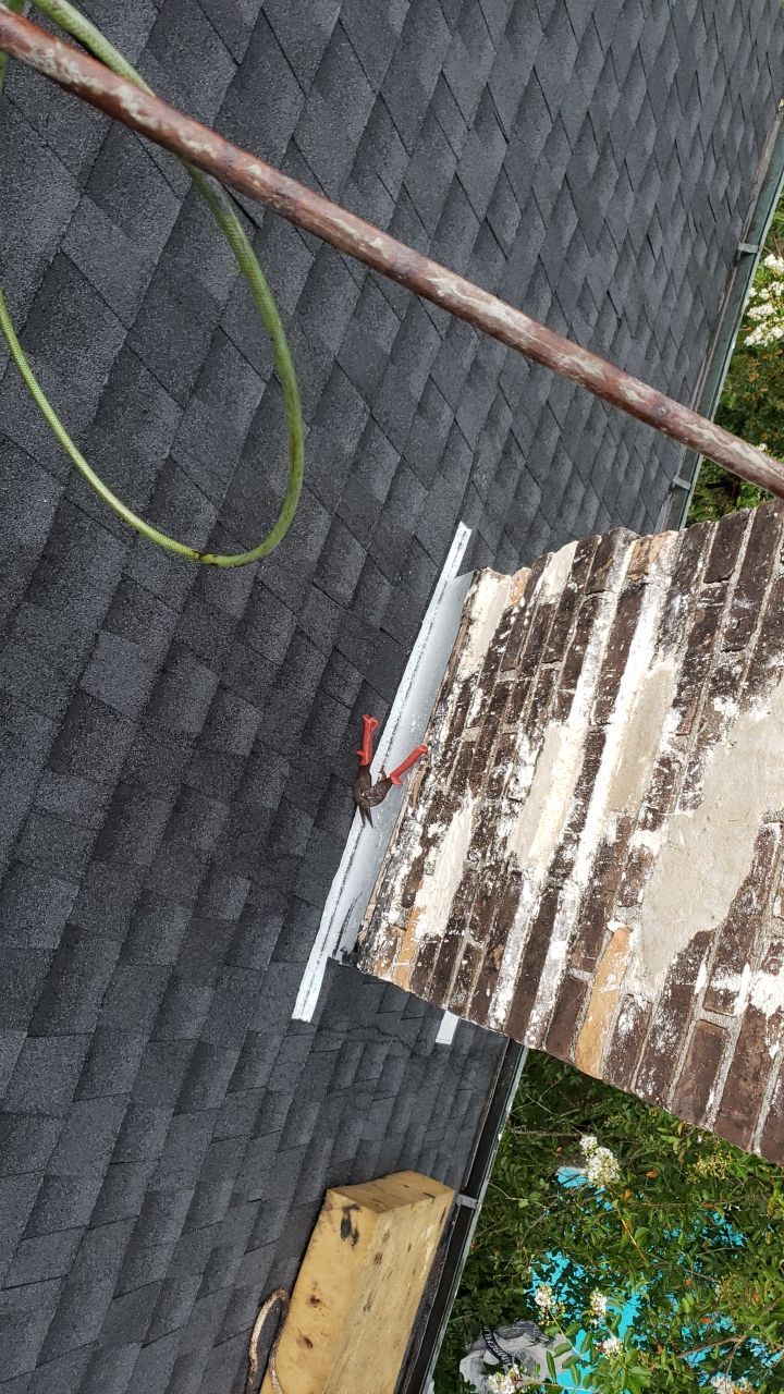 Residential Roofing Installation using Roof Replacement by American Roofing & Construction LLC