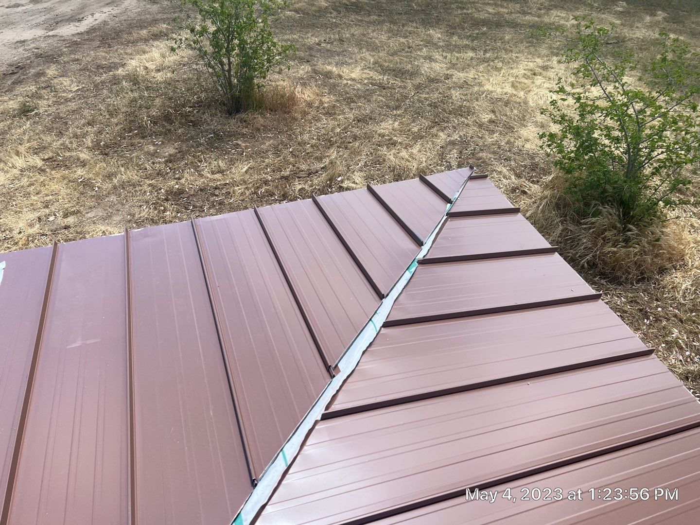 Metal roofing installation using Standing seam metal roofing system by Straight Edge Roofing Inc
