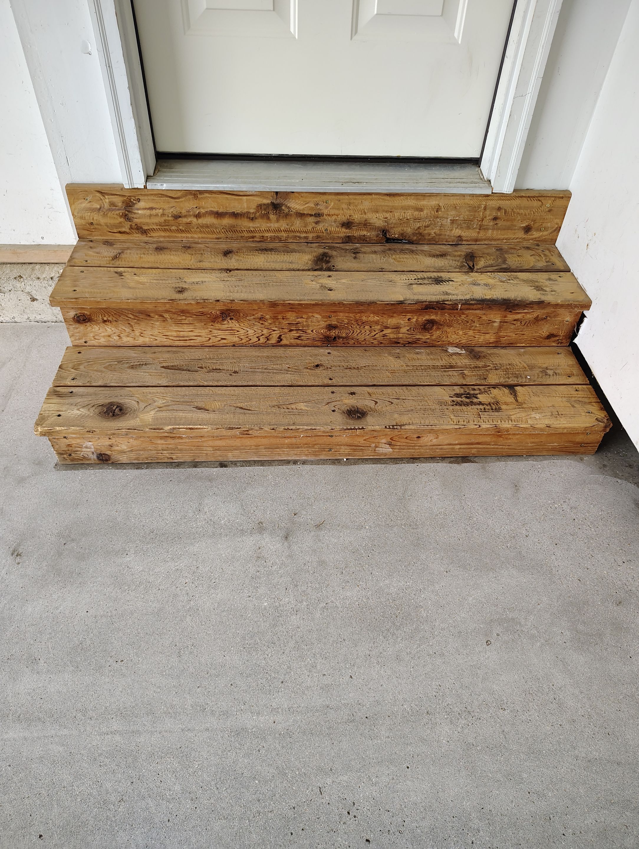 Decorative Chip Epoxy Garage Floor Coating in Sioux Falls by Select Painting, Coatings & Garage Cabinets
