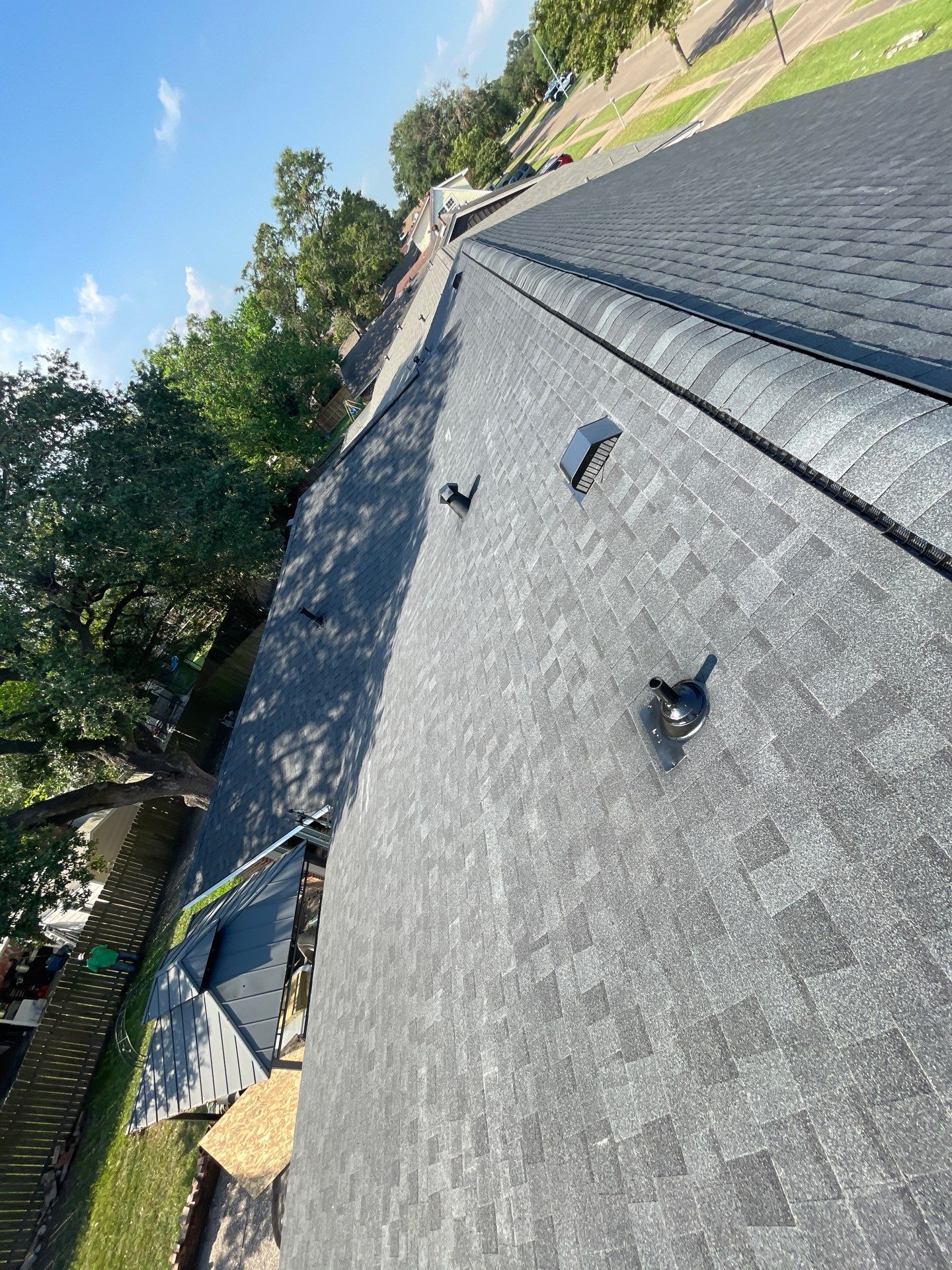 Residential Roofing Installation using Tamko Heritage® Series Rustic Black by CAP Roofing and Construction LLC