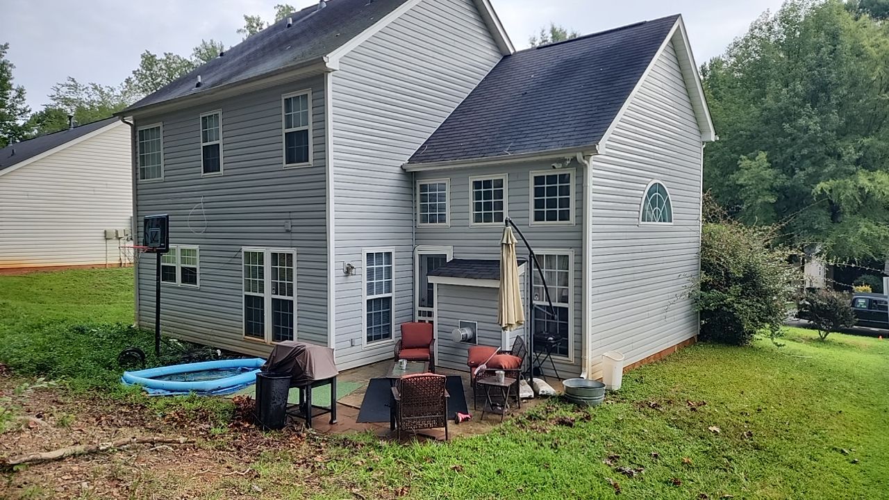 House Wash using cleaner by Power Wash Masters LLC