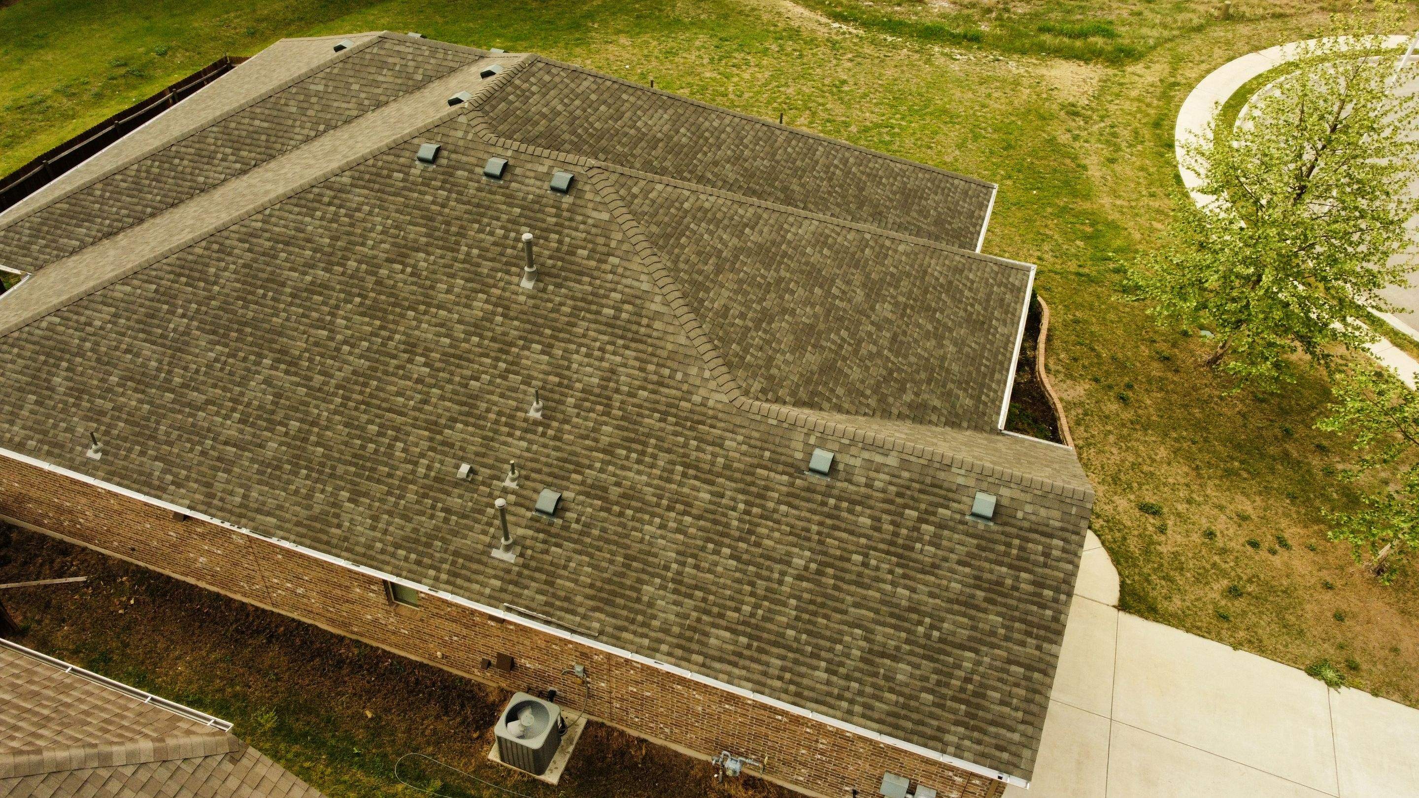 Residential Roof Replacement with Oakridge Asphalt Shingles in Leander by Caliber Restoration LLC