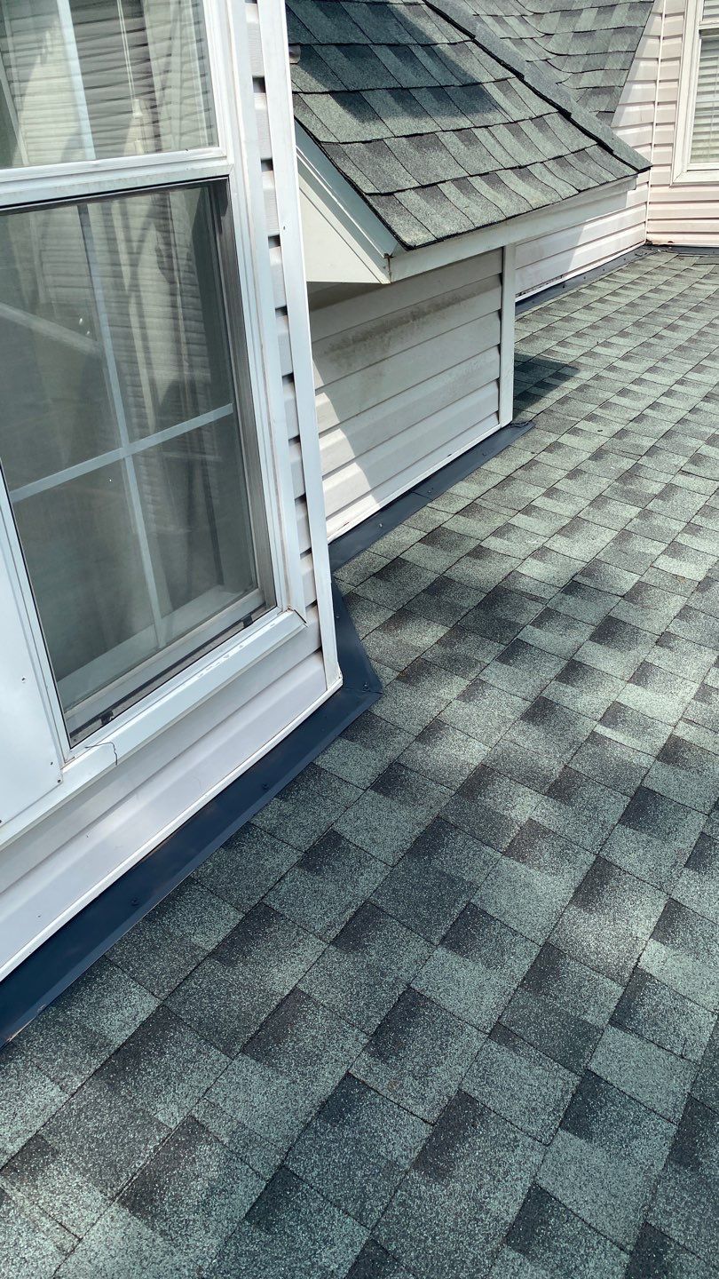 Residential Roofing Installation using Roof Replacement by American Roofing & Construction LLC