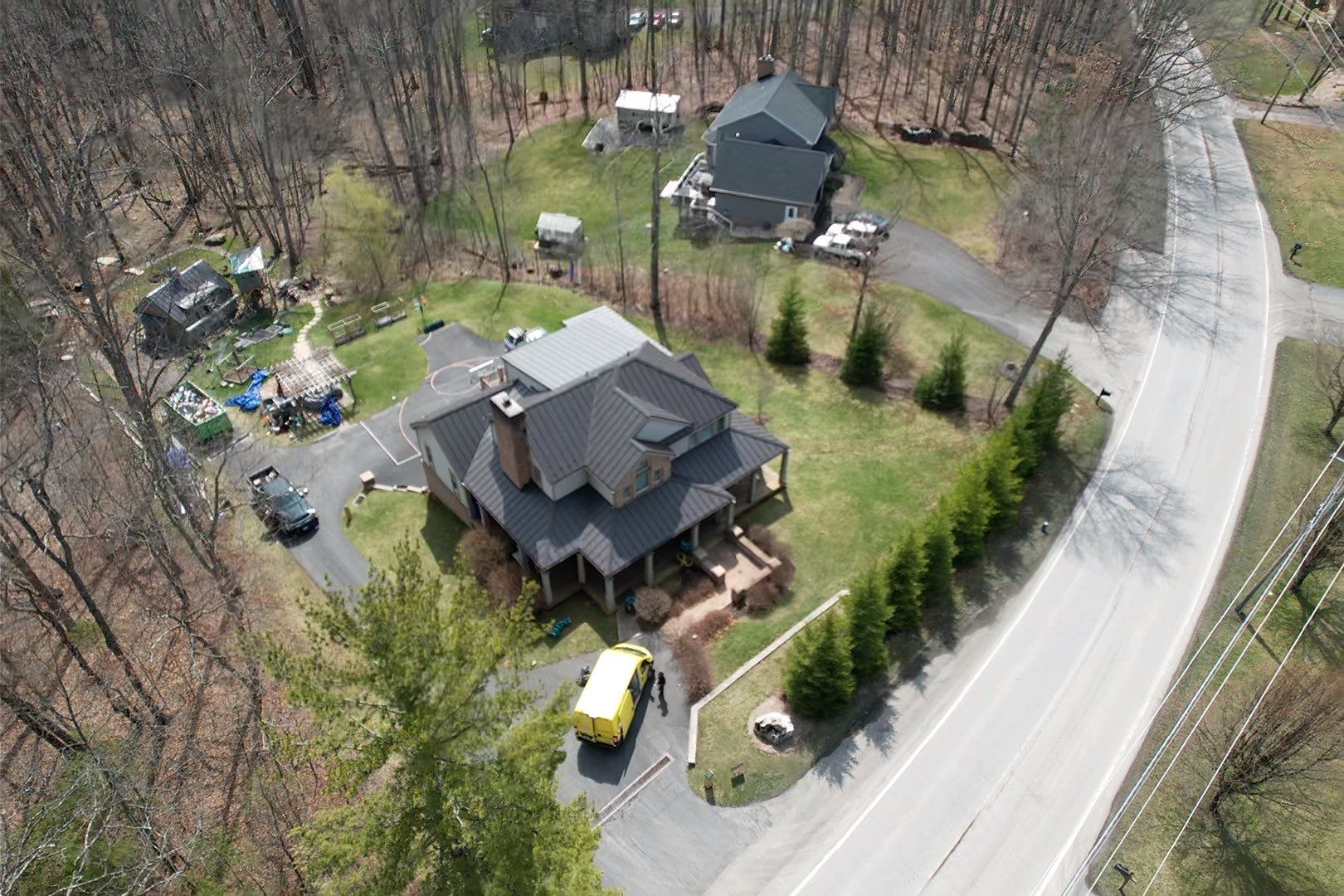 Metal Roof Replacement  by American Home Contractors