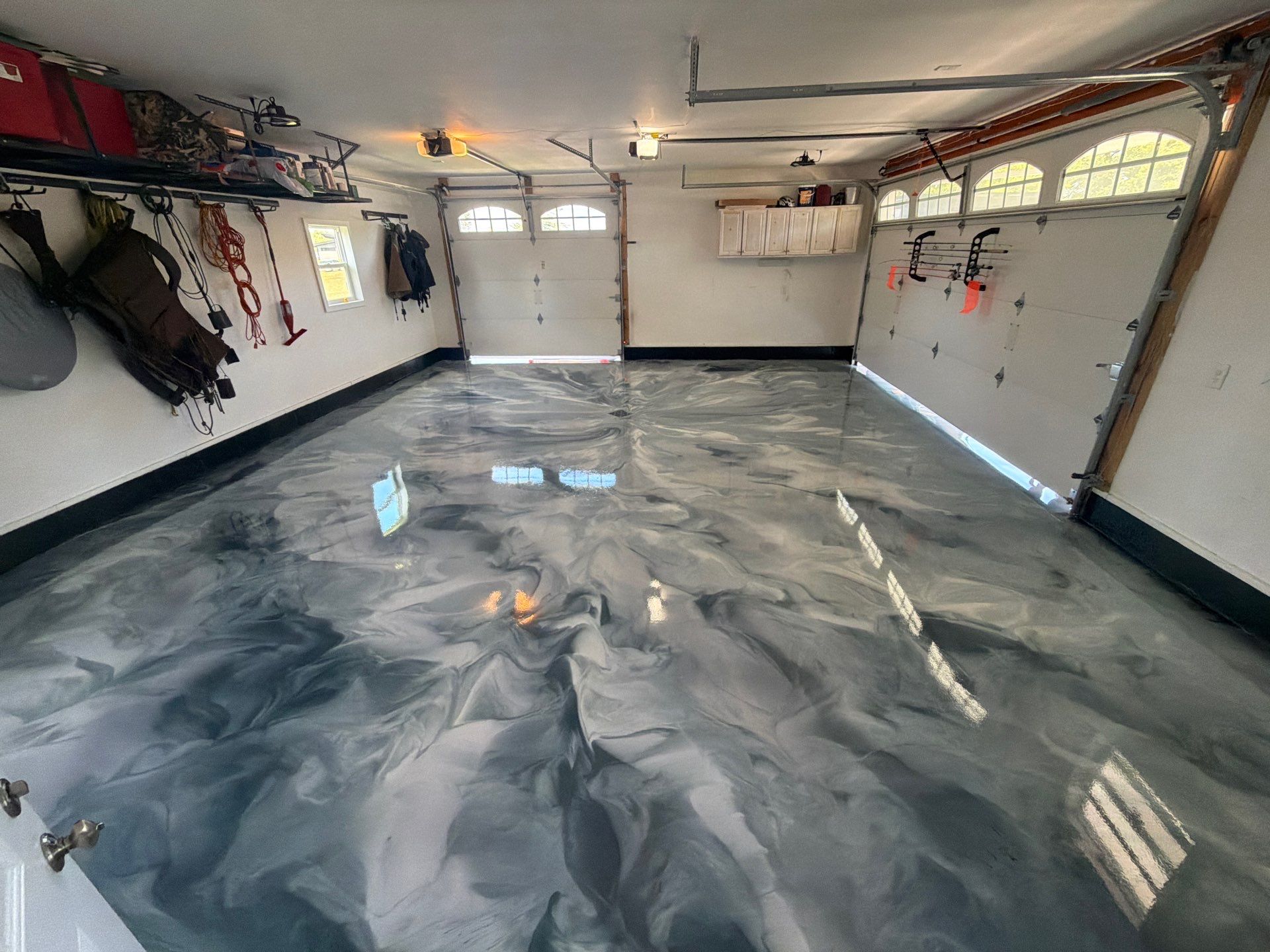 Custom Metallic Epoxy Floor and Polished Countertop Installation in Mears by Gordon Painting