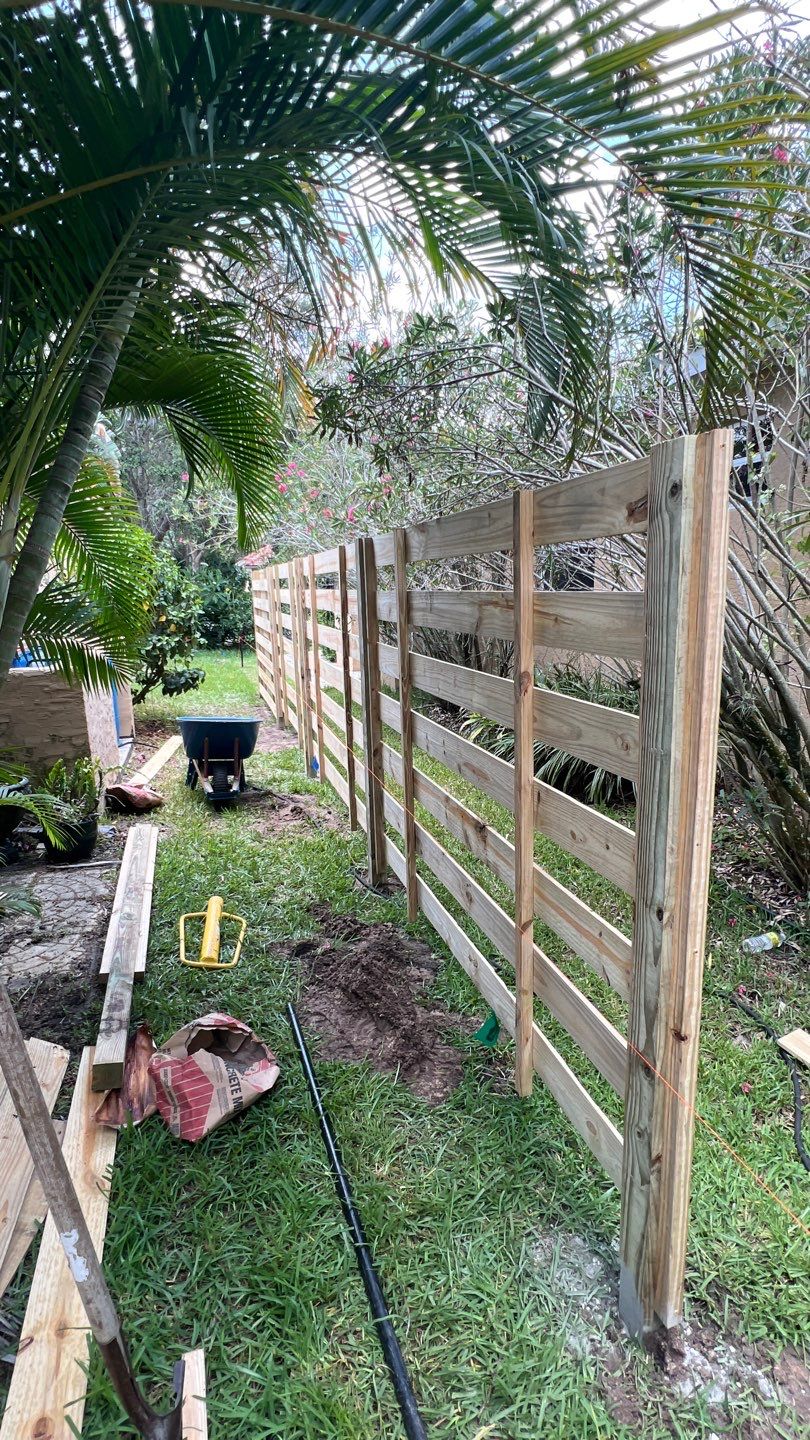 Osprey, FL 6ft. Tall Treated Horizontal Shadowbox Wood Fence by Asap fence and gates, LLC
