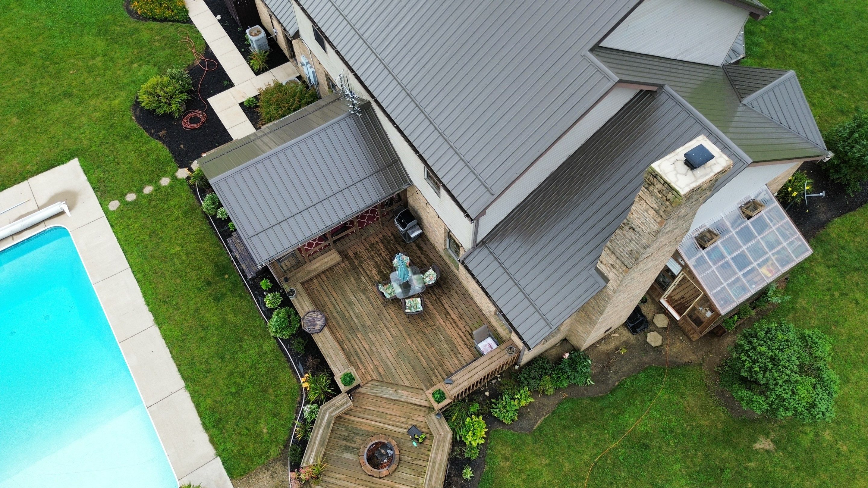Residential Roofing Installation using Performance Panel Metal - Burnished Slate by RoofX 