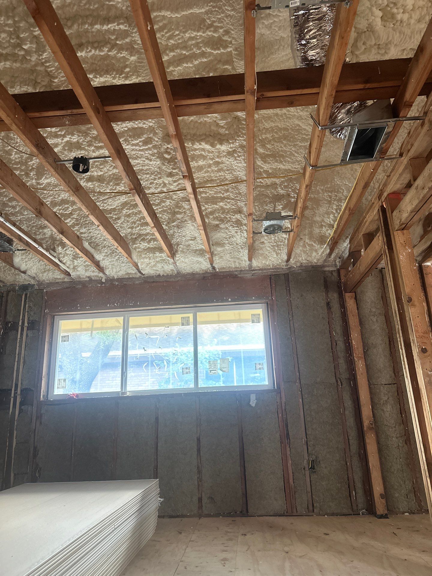 Open cell spray foam & rockwool job completed in Dallas TX by Apex Insulation Solutions