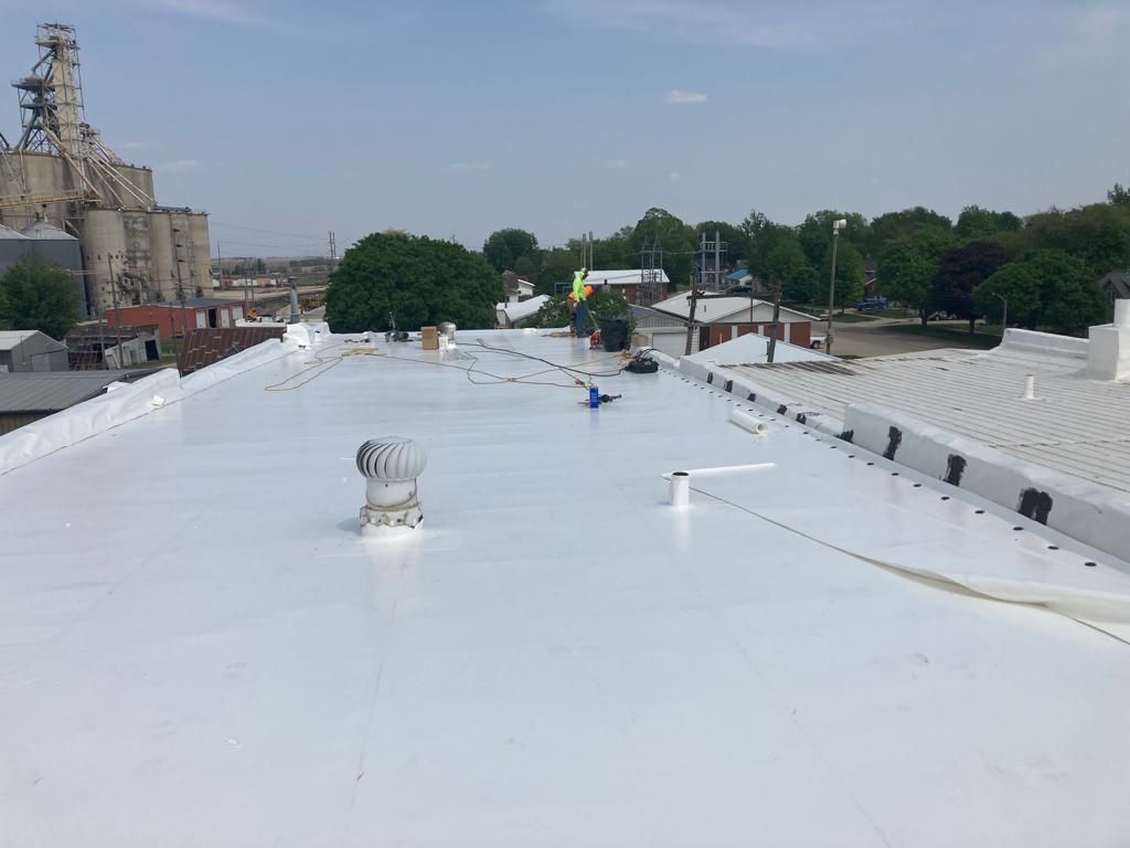 Recover of a downtown building  by Grell Roofing, LLC