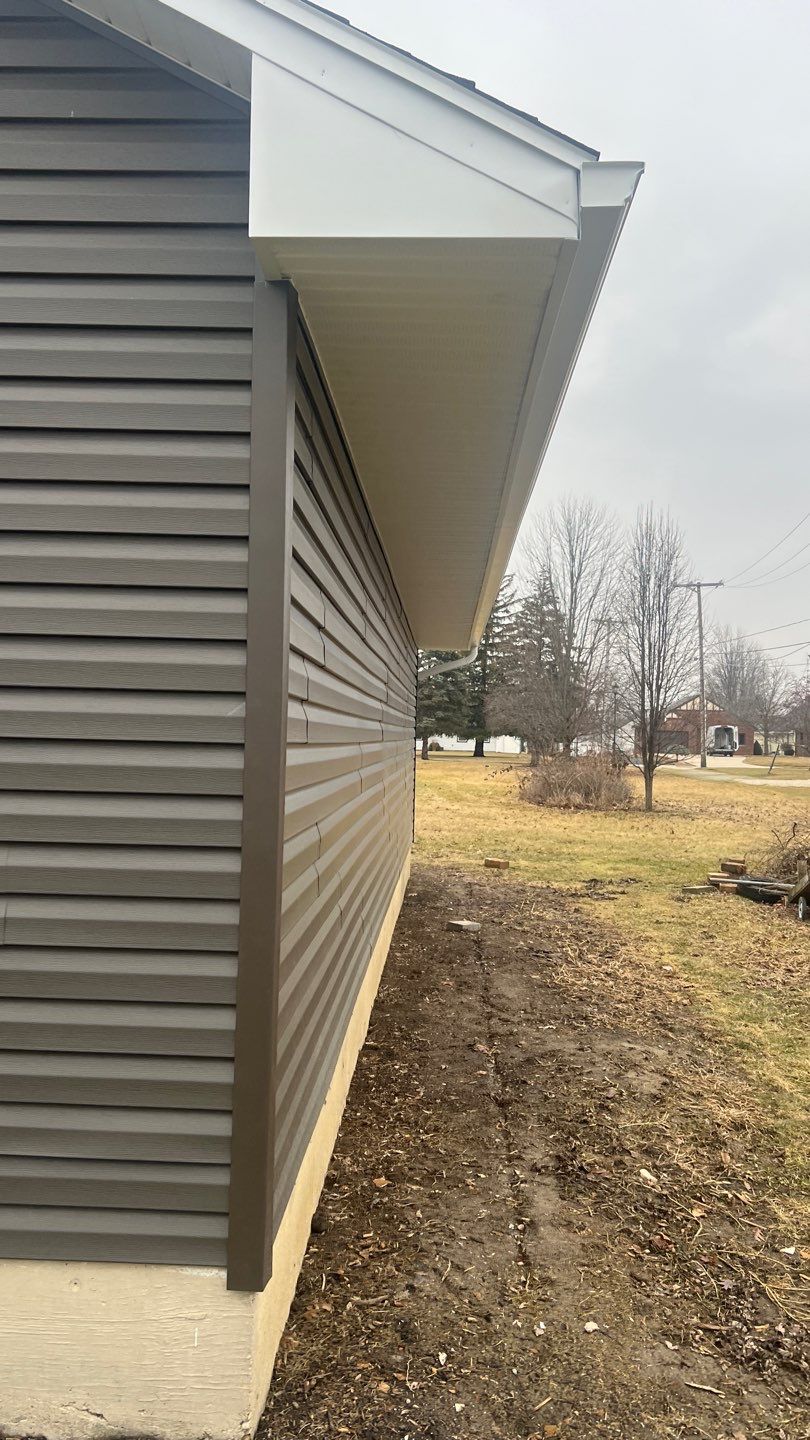 Residential fascia replacement using Exterior Portfolio 4.5 DL - Peppercorn by Nitro Roofing and Construction