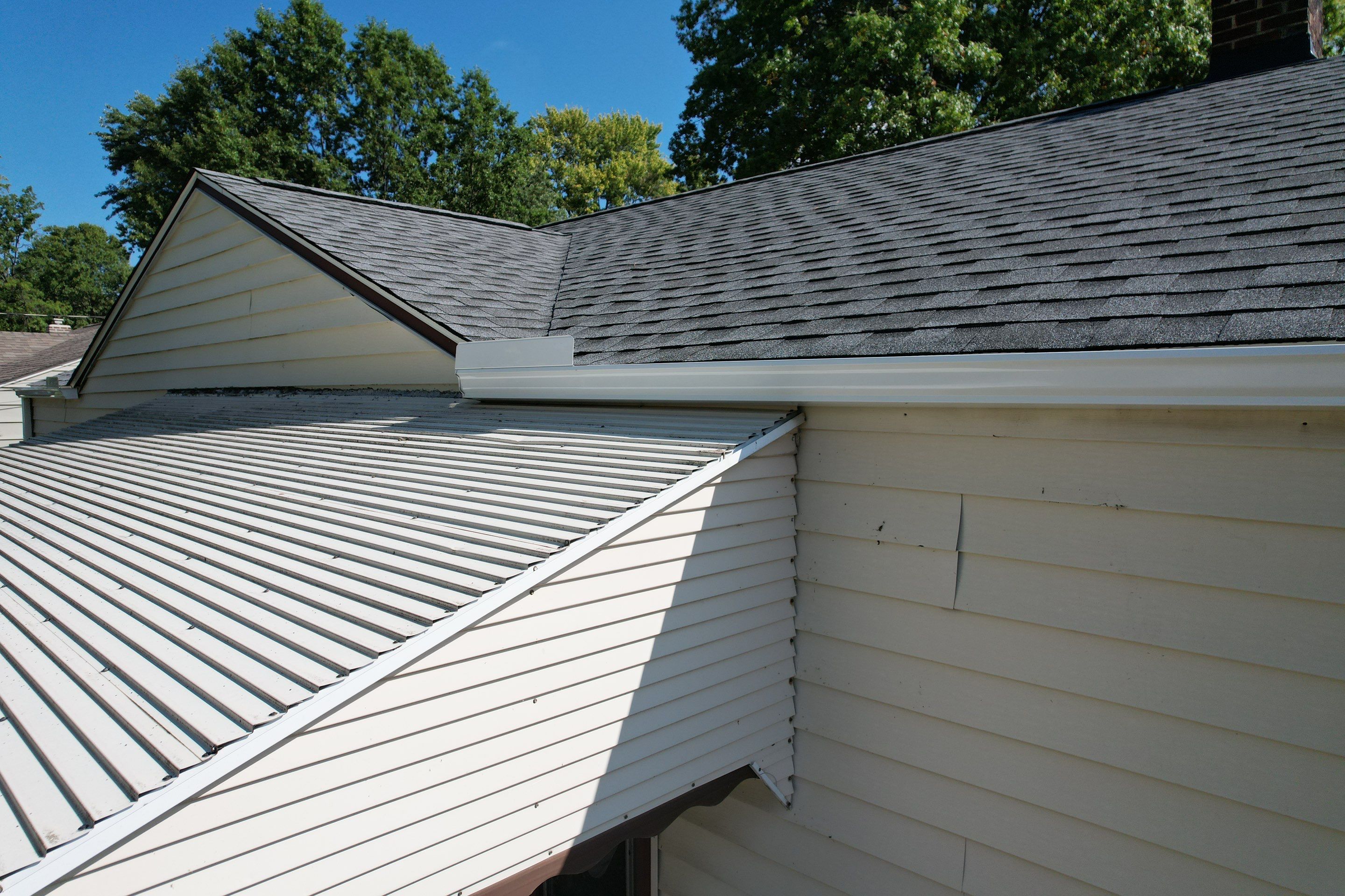 East Lake Roof & Garage  Replacement (With Gutters) by Atlas Roofing & Restoration