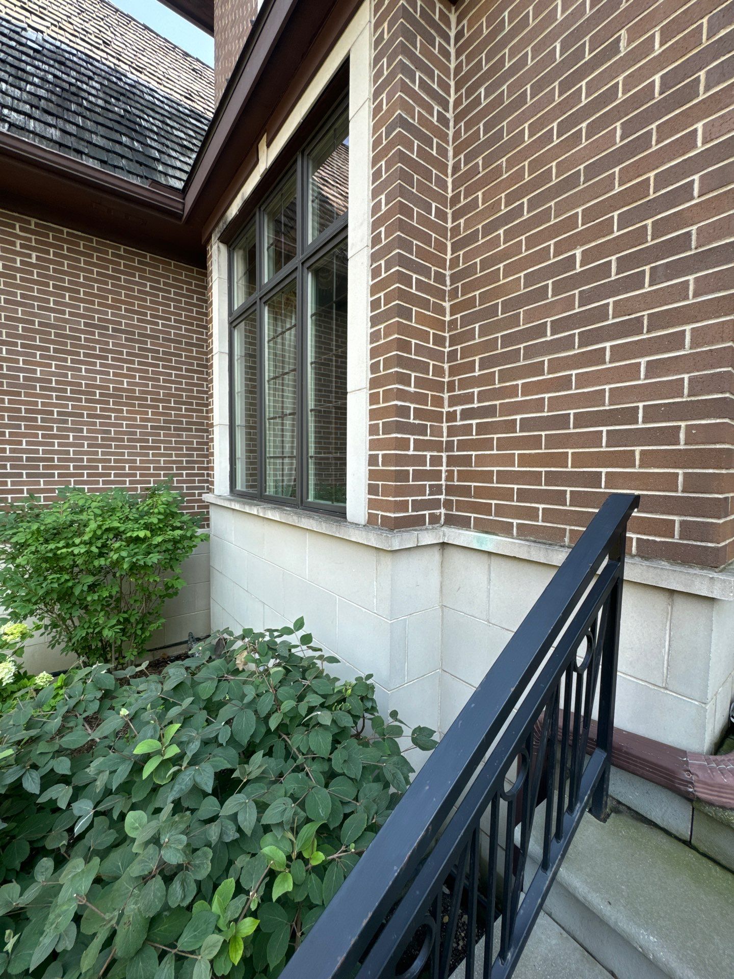 natural stone using Algaecide, soft wash soap by Northern Power Washing LLC.