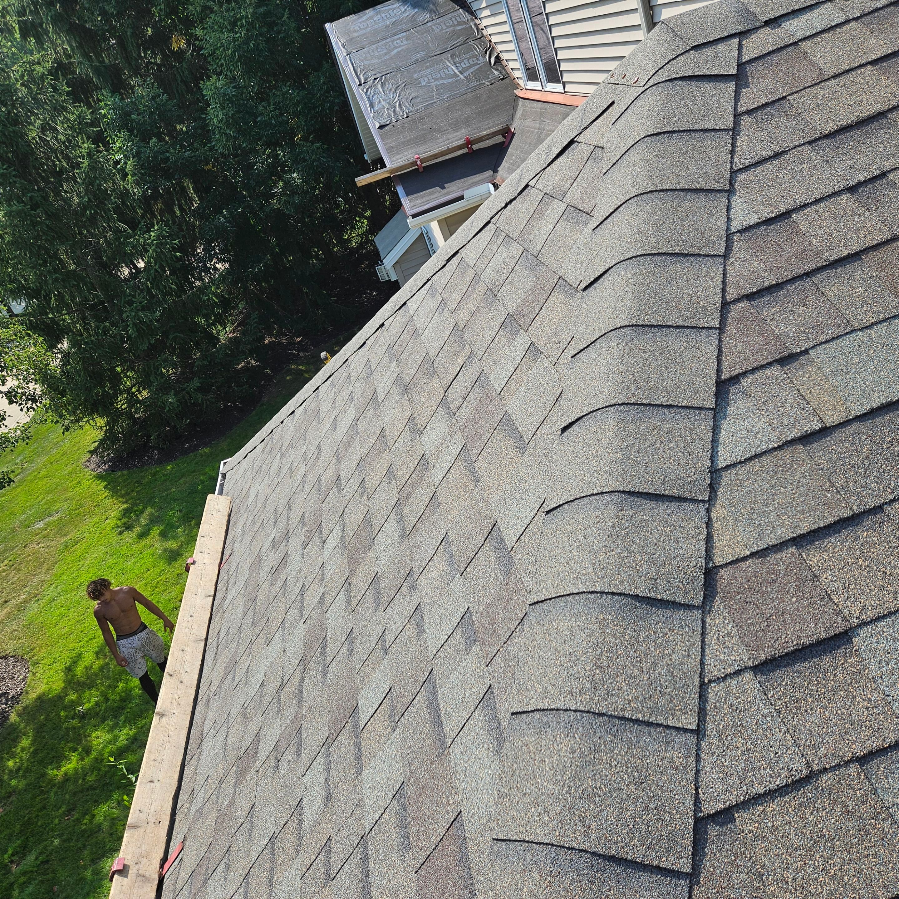 Residential Roof Replacement using Owens Corning Duration Driftwood by Absolute Roofing and Construction