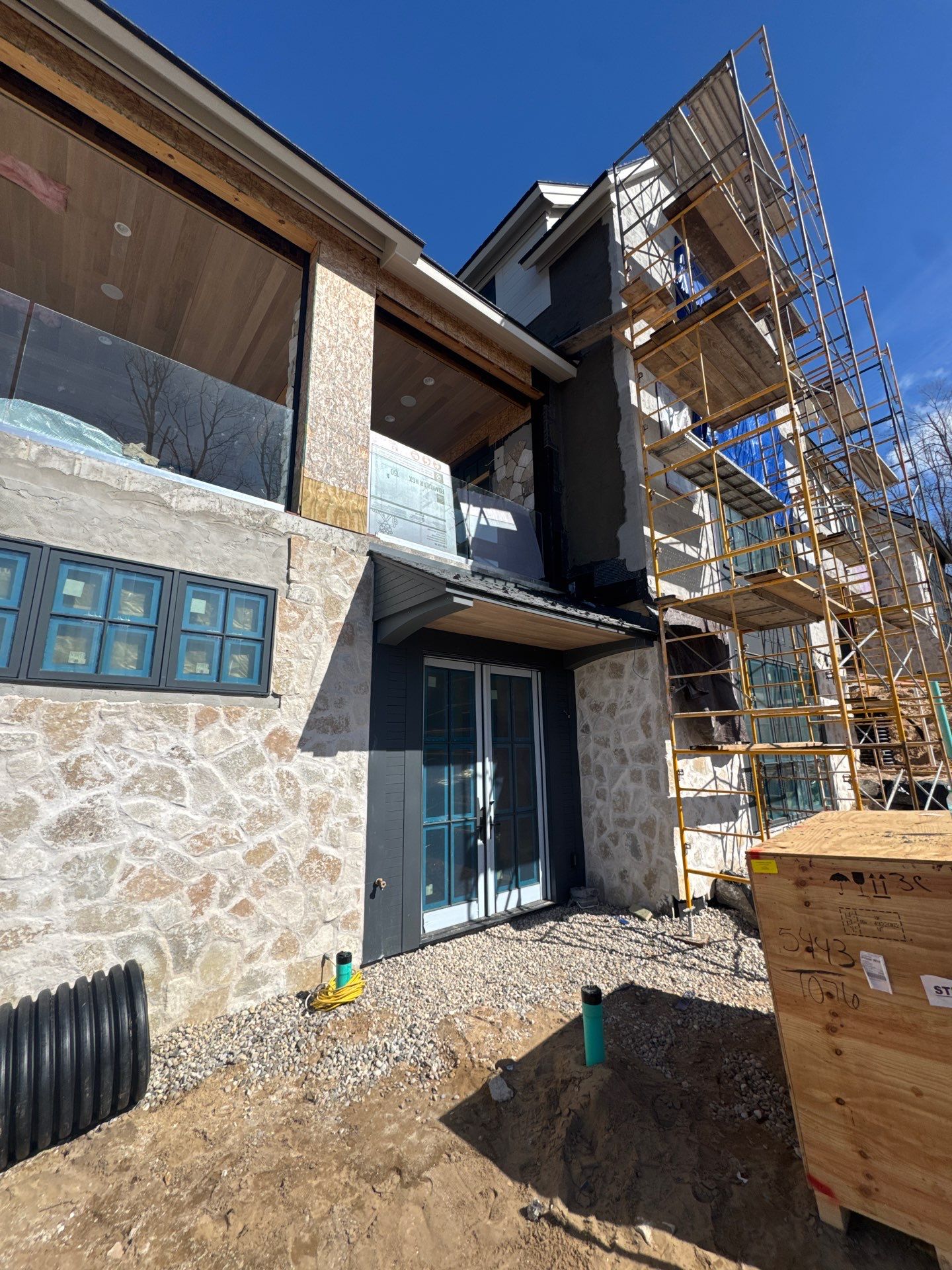 Half Round Gutter Installation for Petoskey Residence by Rainbow Seamless Systems