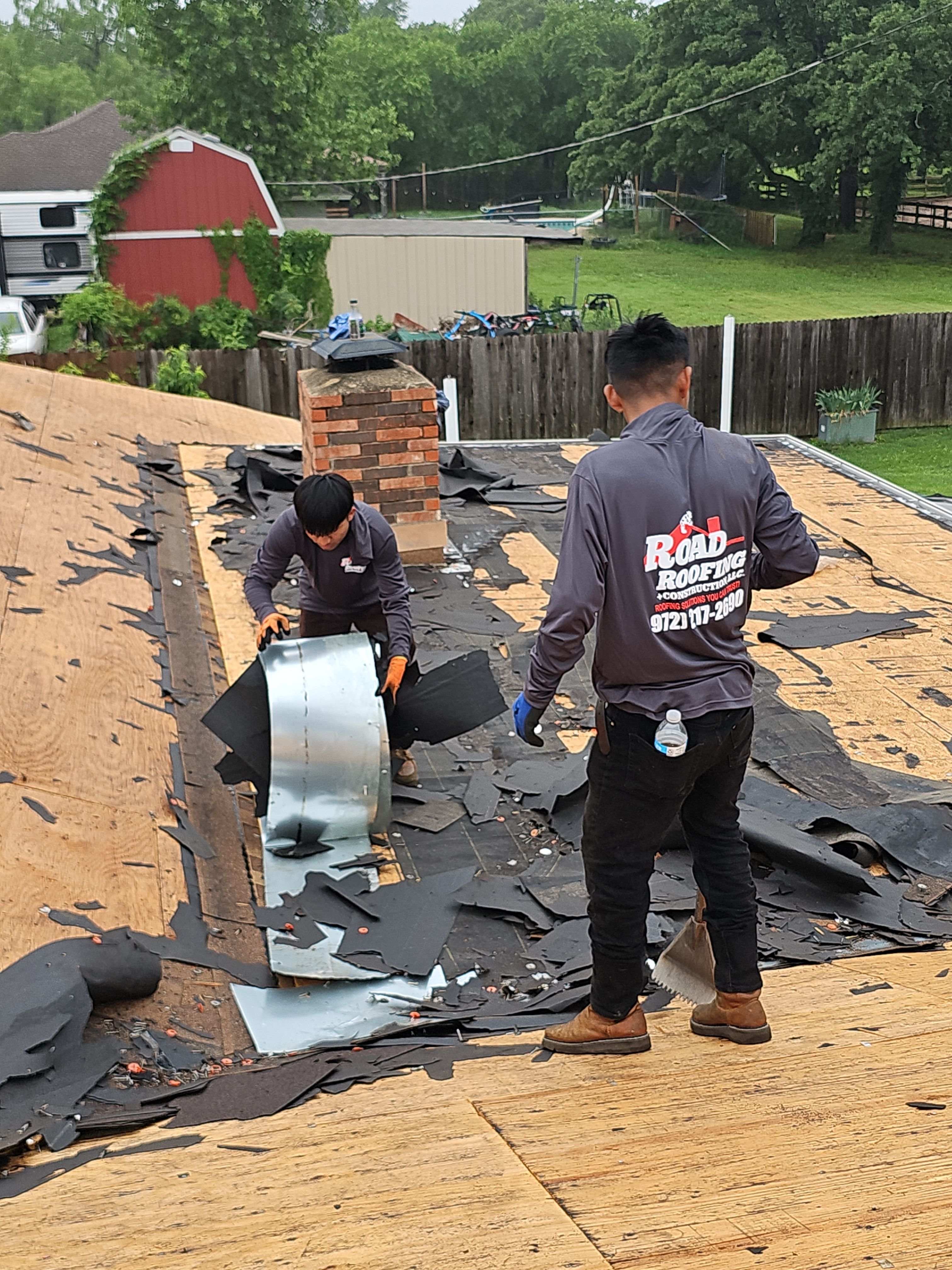 "Full Roof Replacement Due to Hail and Water Damage – Before & After" by road roofing llc