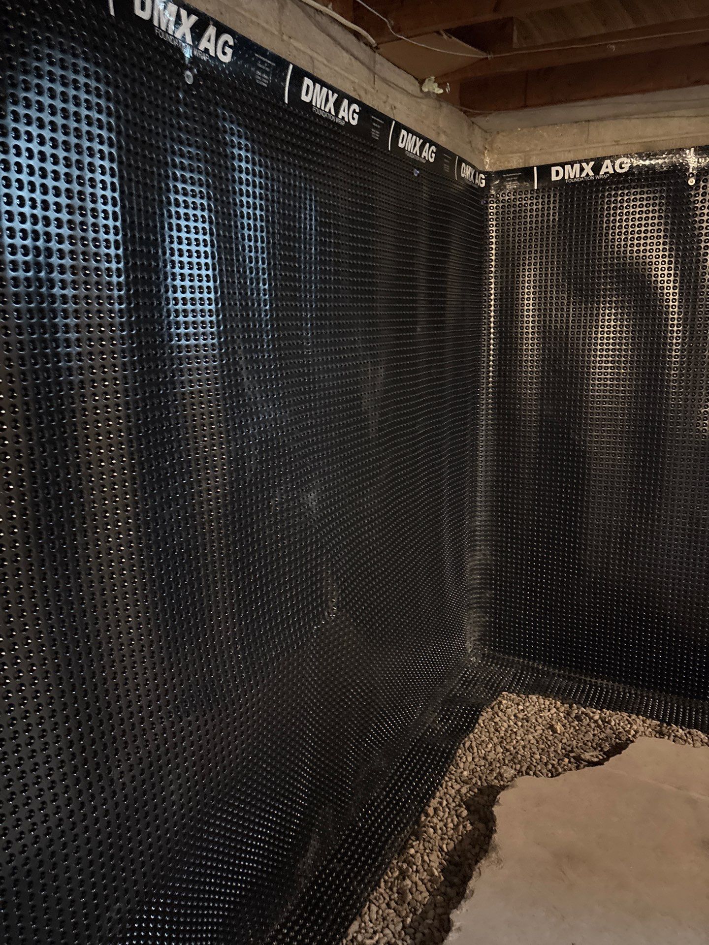 Interior Drain Tile & Buried Discharge in South Minneapolis by Waterproofing Northeast