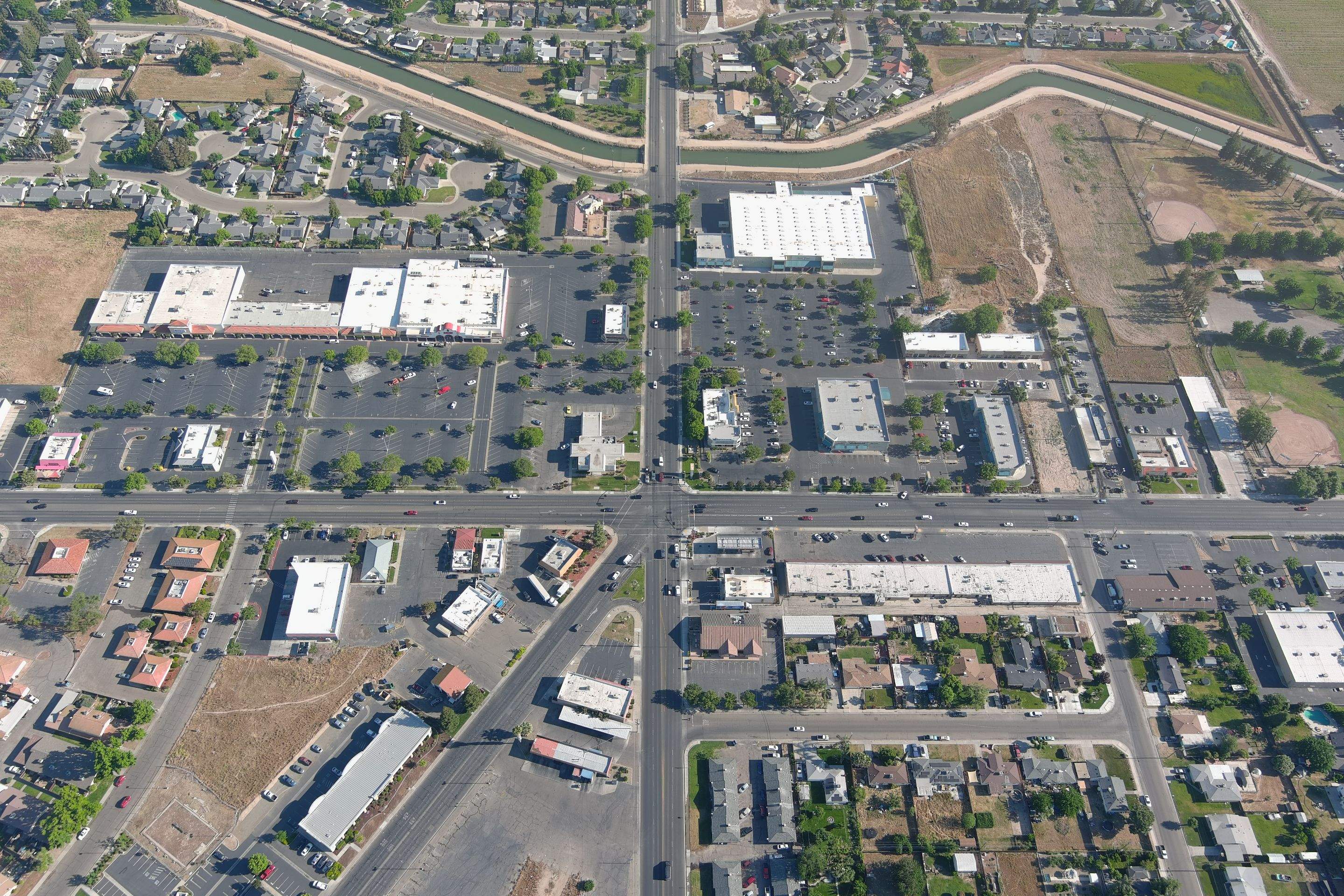 Metal roof restoration on commercial roof using Conklin Benchmark/ PUMA XL acrylic coatings over metal and foam by Straight Edge Roofing Inc