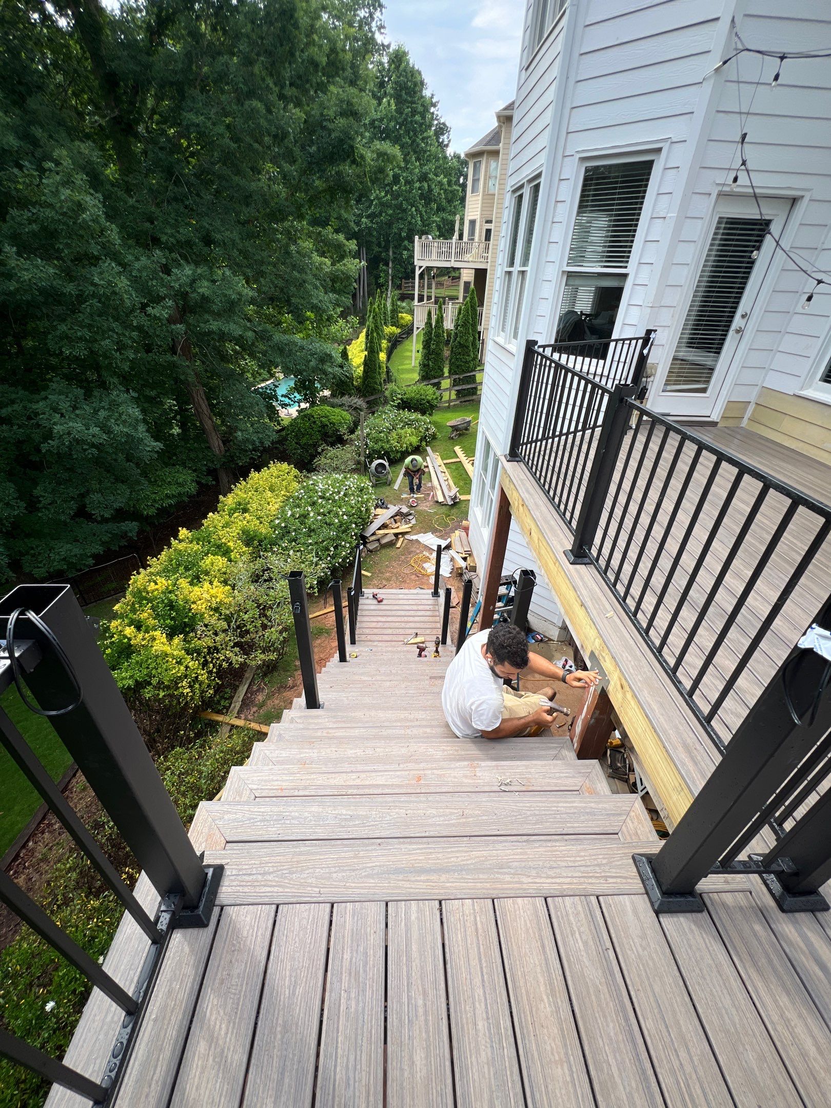 Elevated Composite Deck and Concrete Landing Installation in Kennesaw by Swift Home Renovations