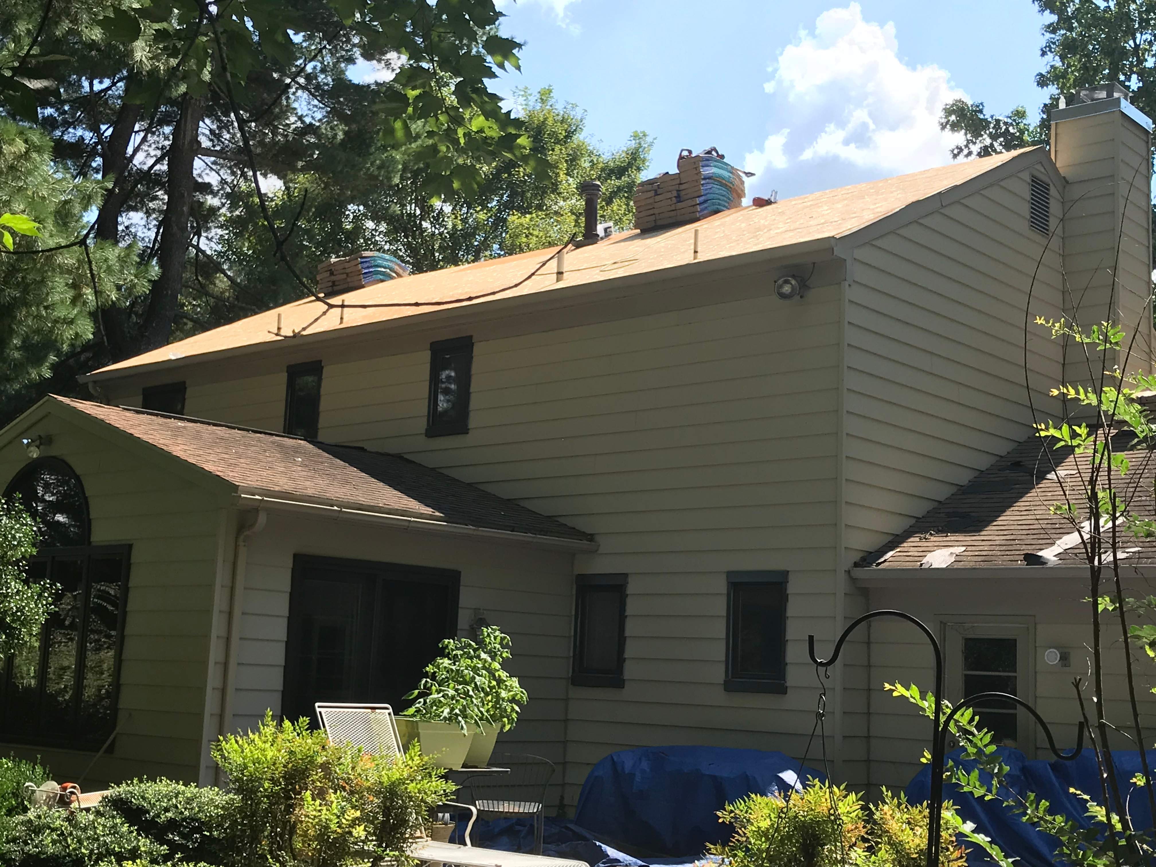 Residential Roofing Installation using Landmark Shingles Color Weatherwood by Alpha Design Services